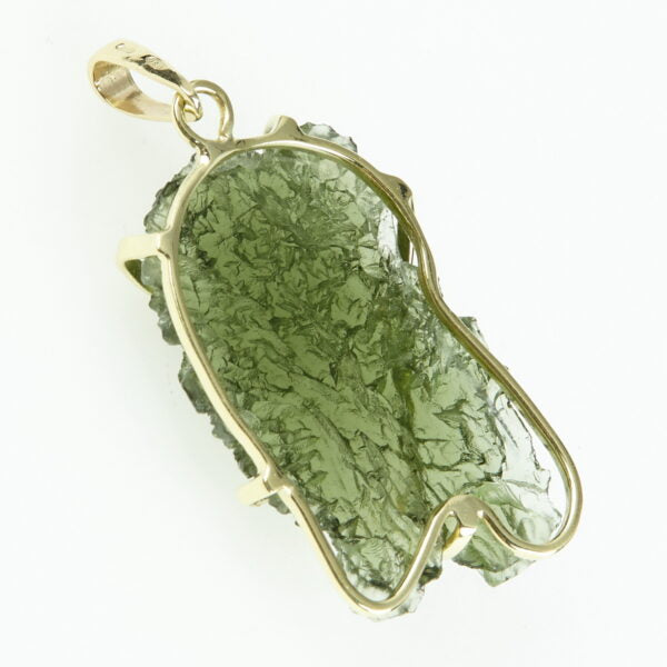Pendente in oro con a moldavite e granati 7094