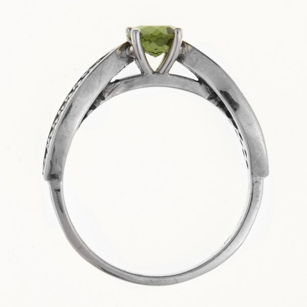 Anello in argento con moldavite e zirconi
