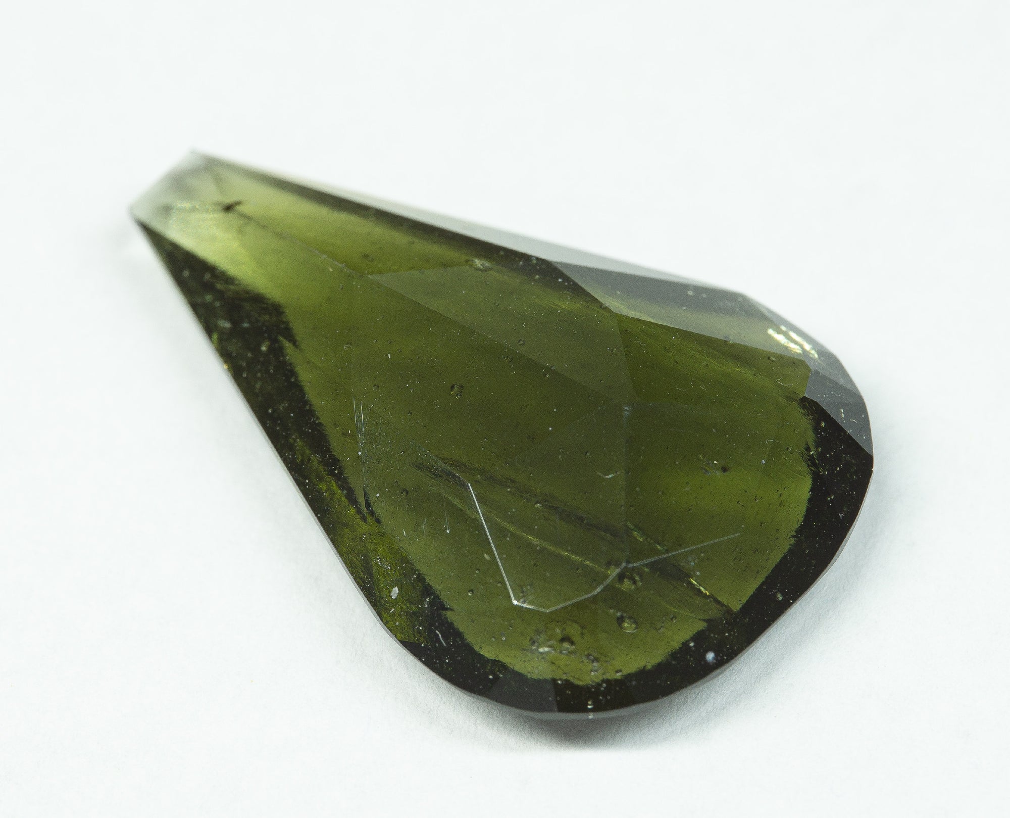Faceted moldavite with a rare bubble 17ct