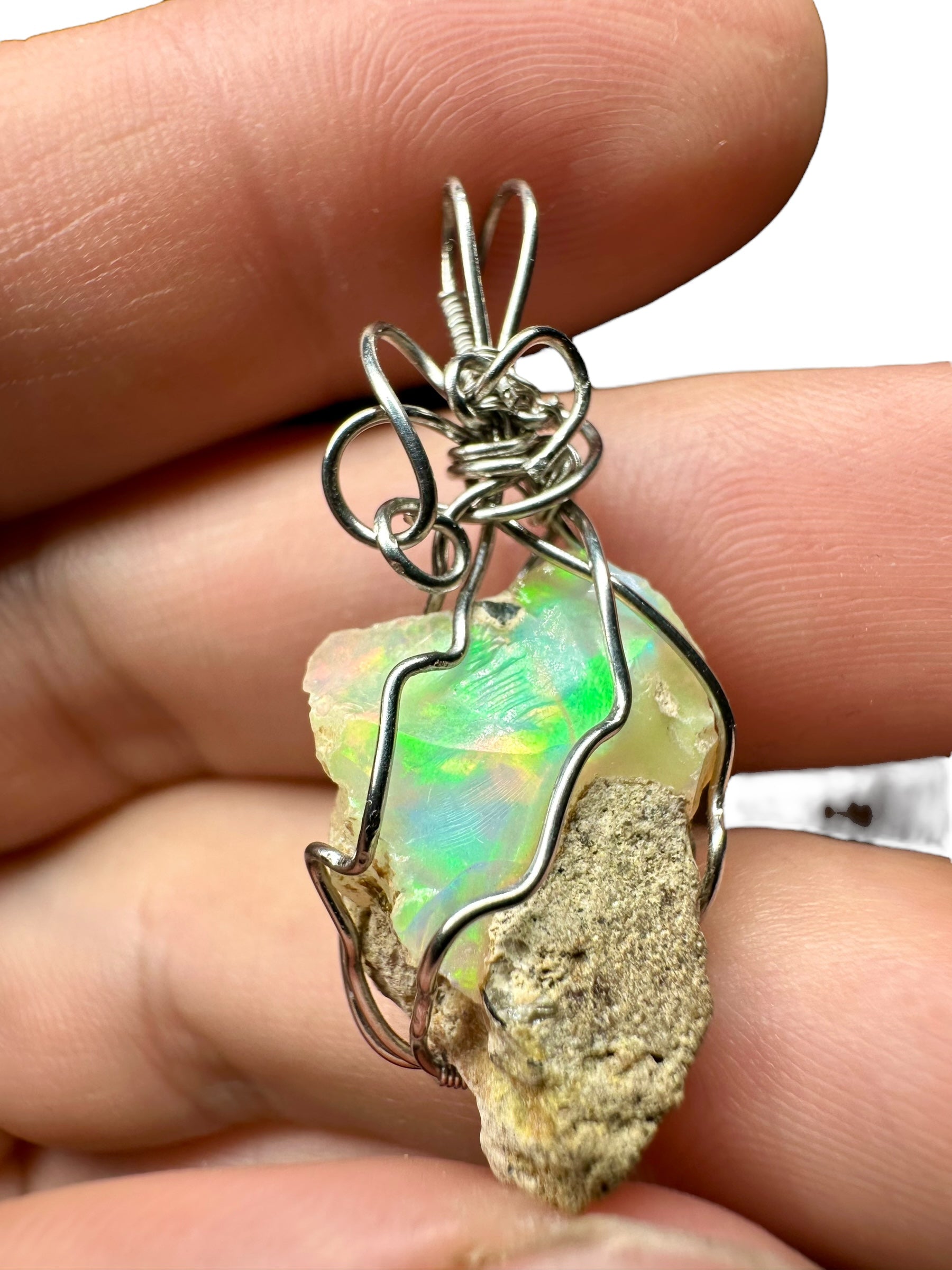 Precious opal pendant