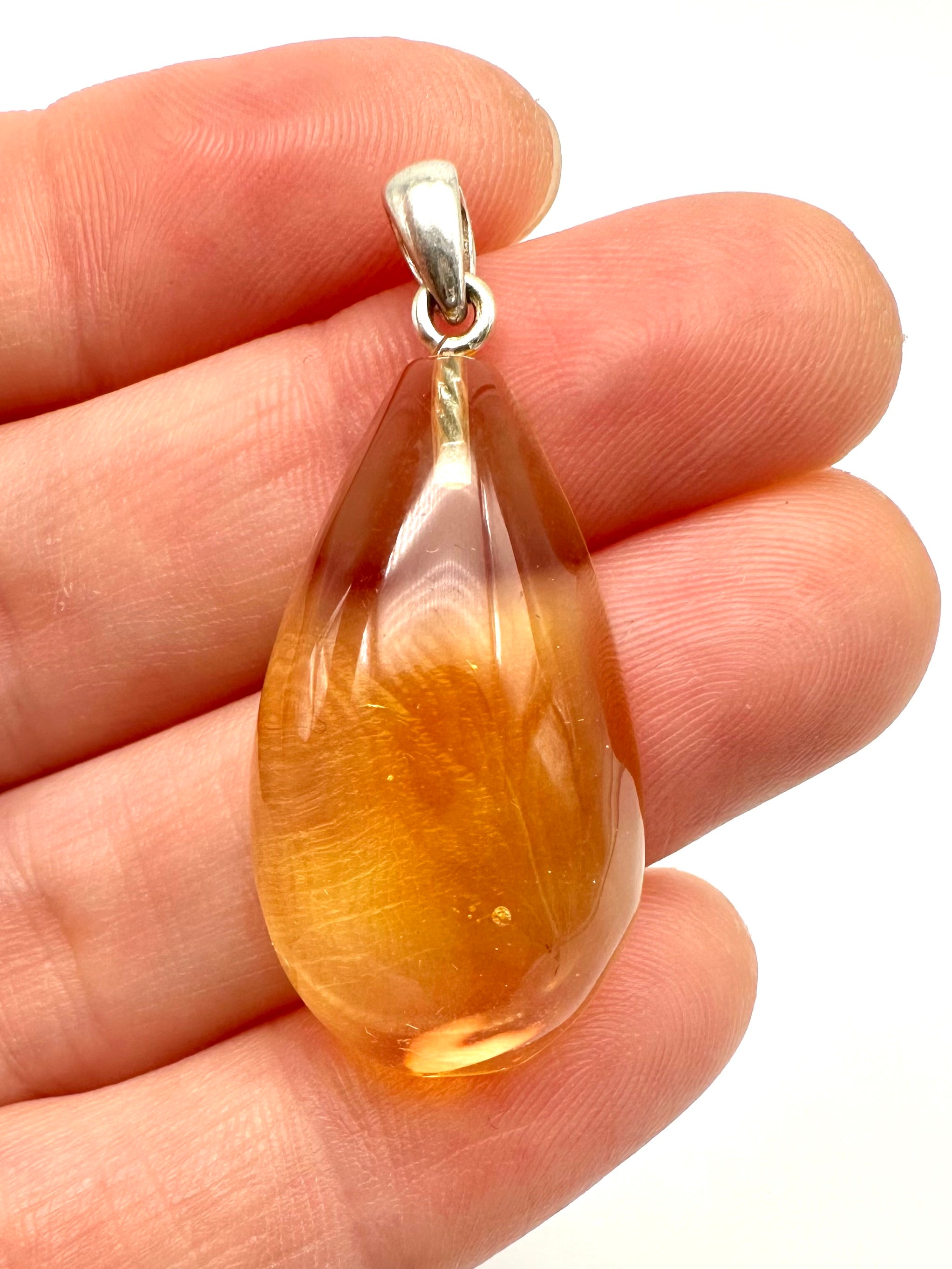 Silver amber pendant