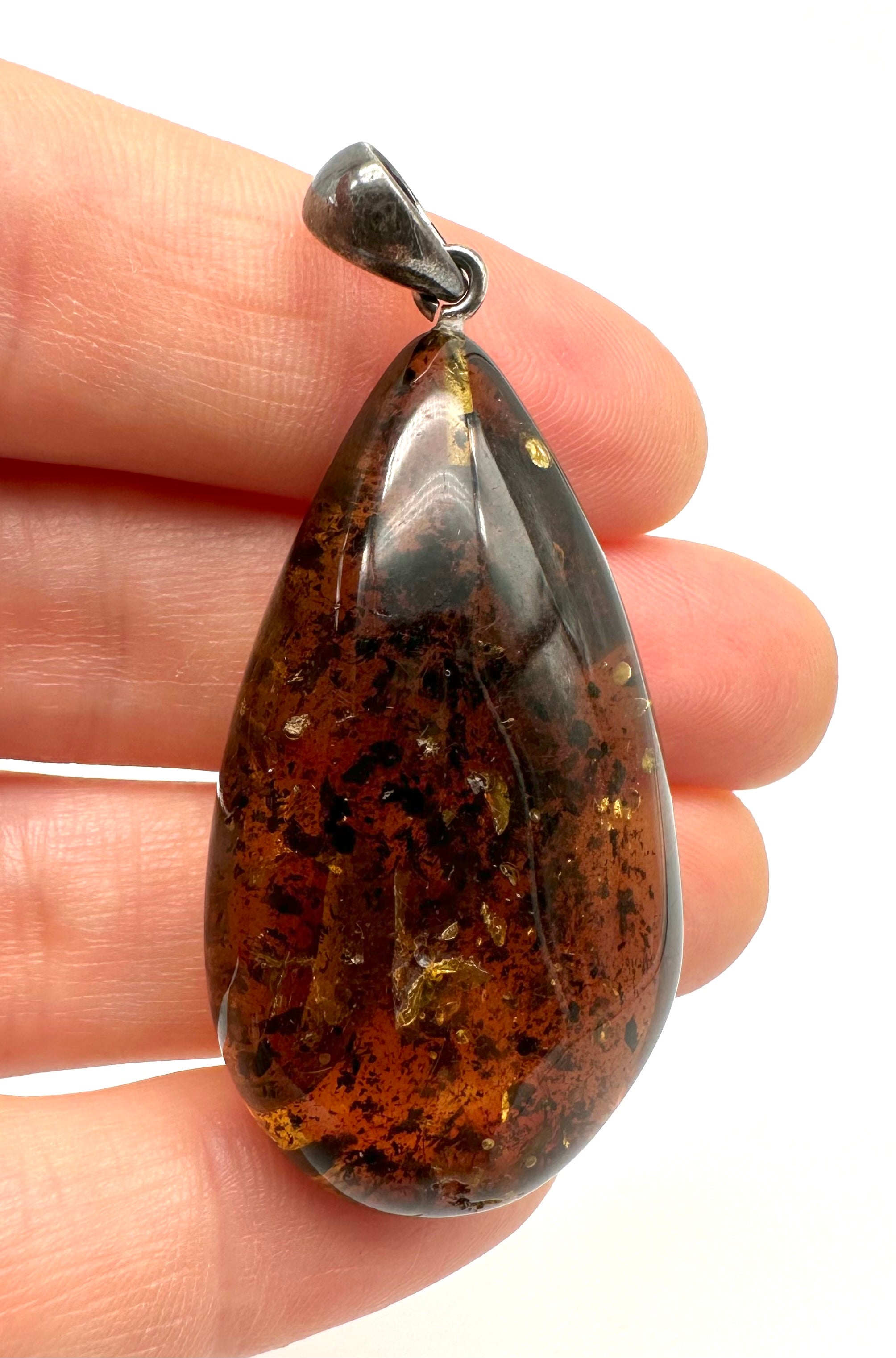 Silver amber pendant