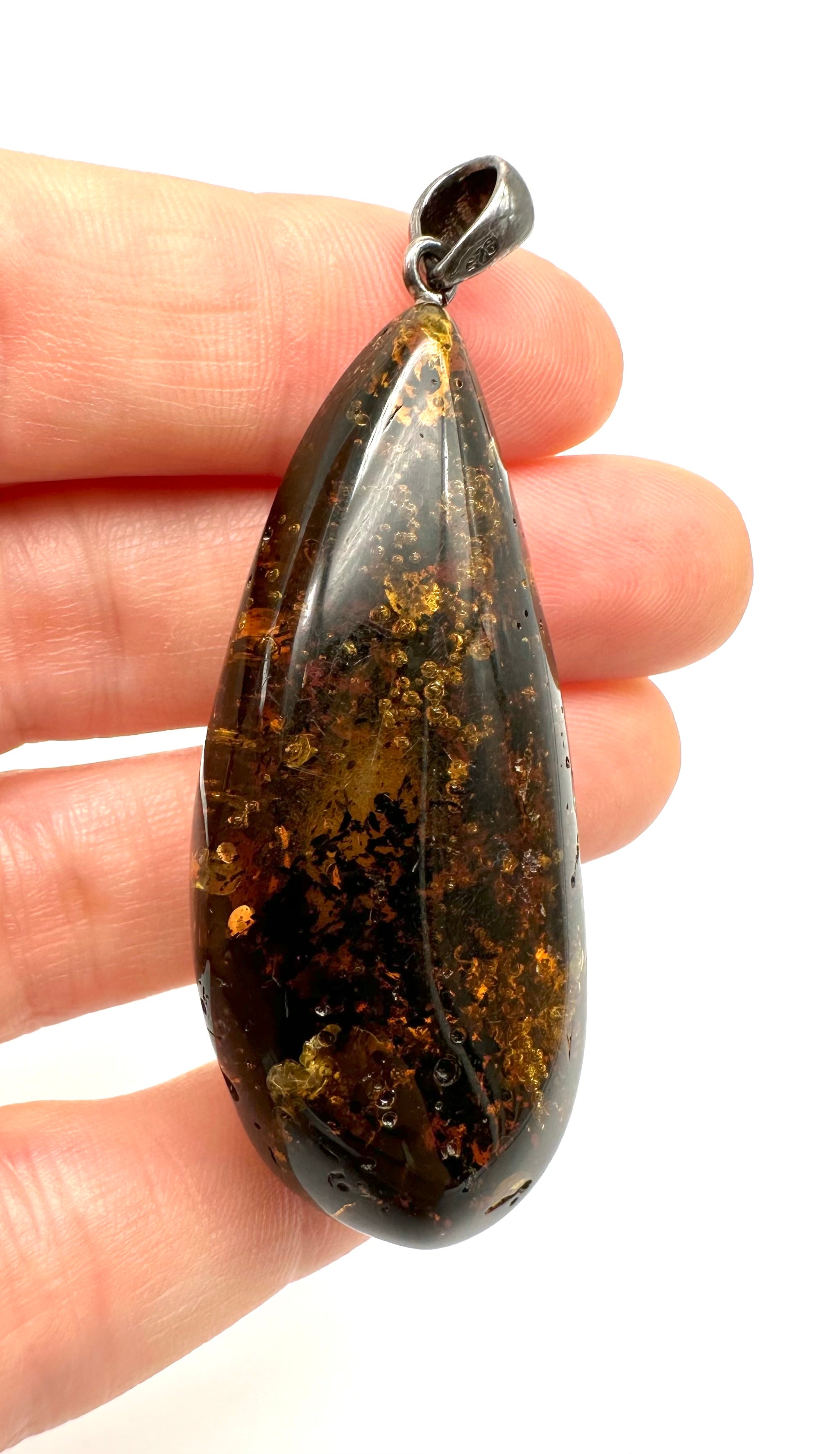 Silver amber pendant