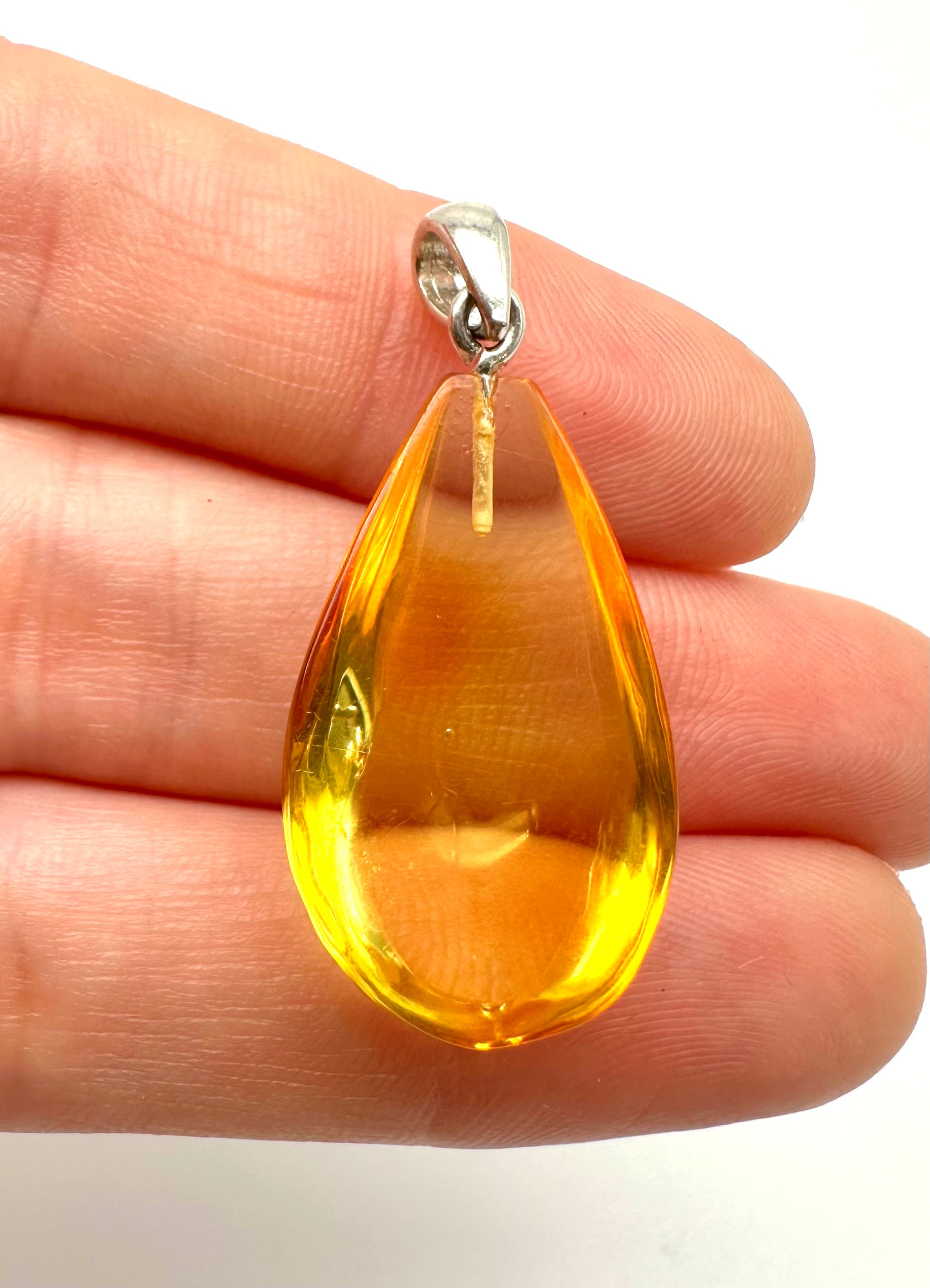 Silver amber pendant