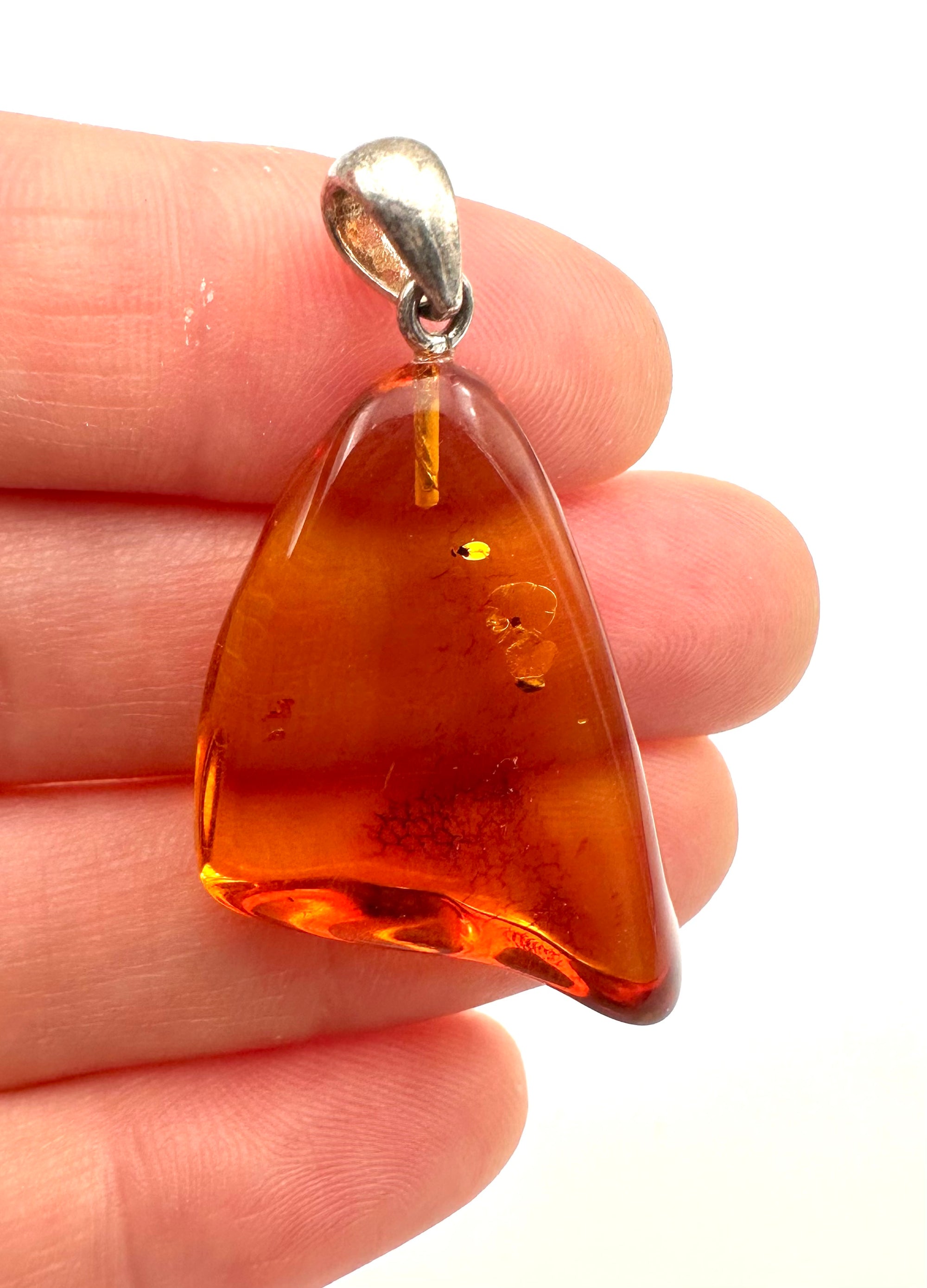 Silver amber pendant