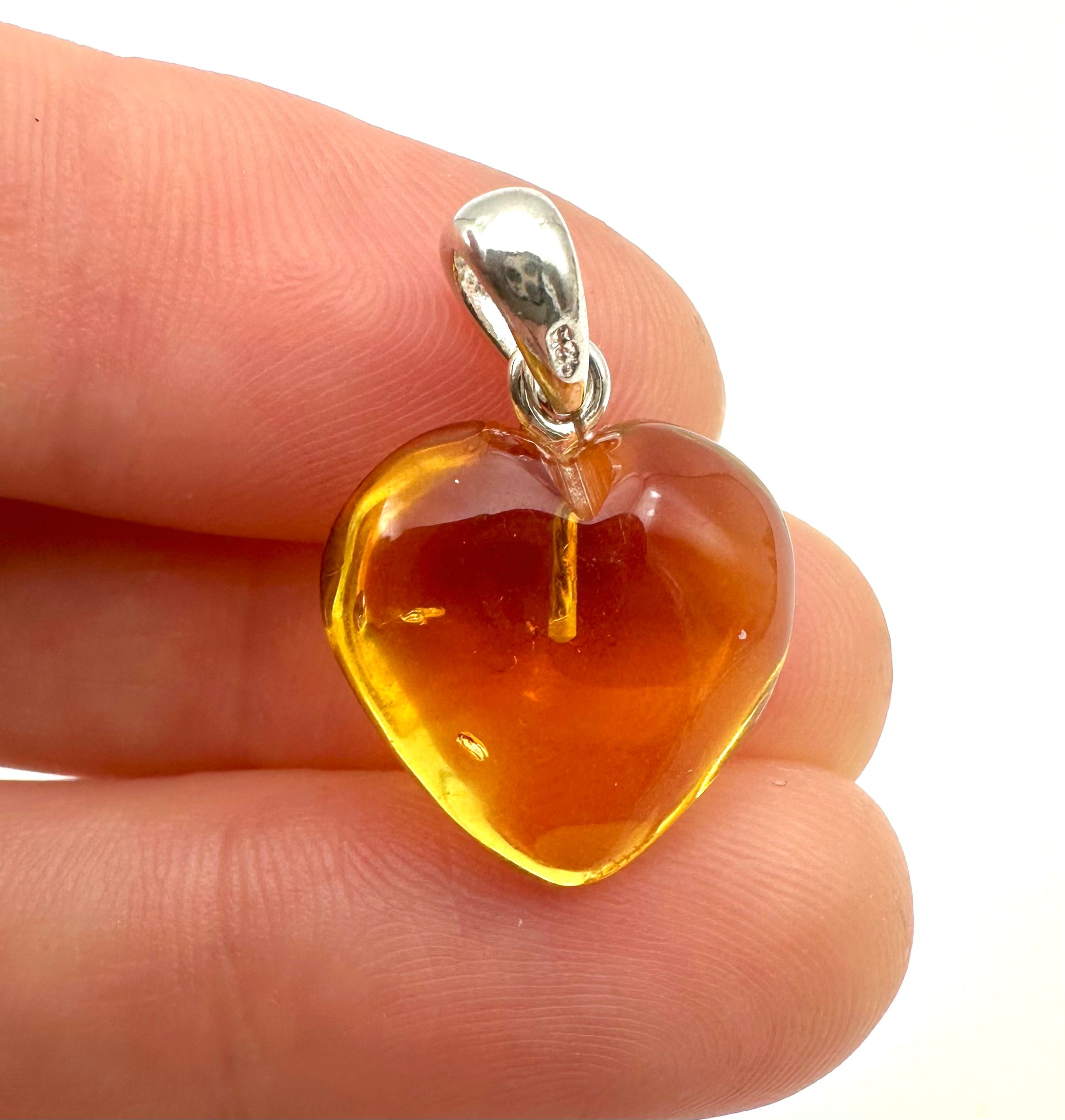 Silver amber pendant