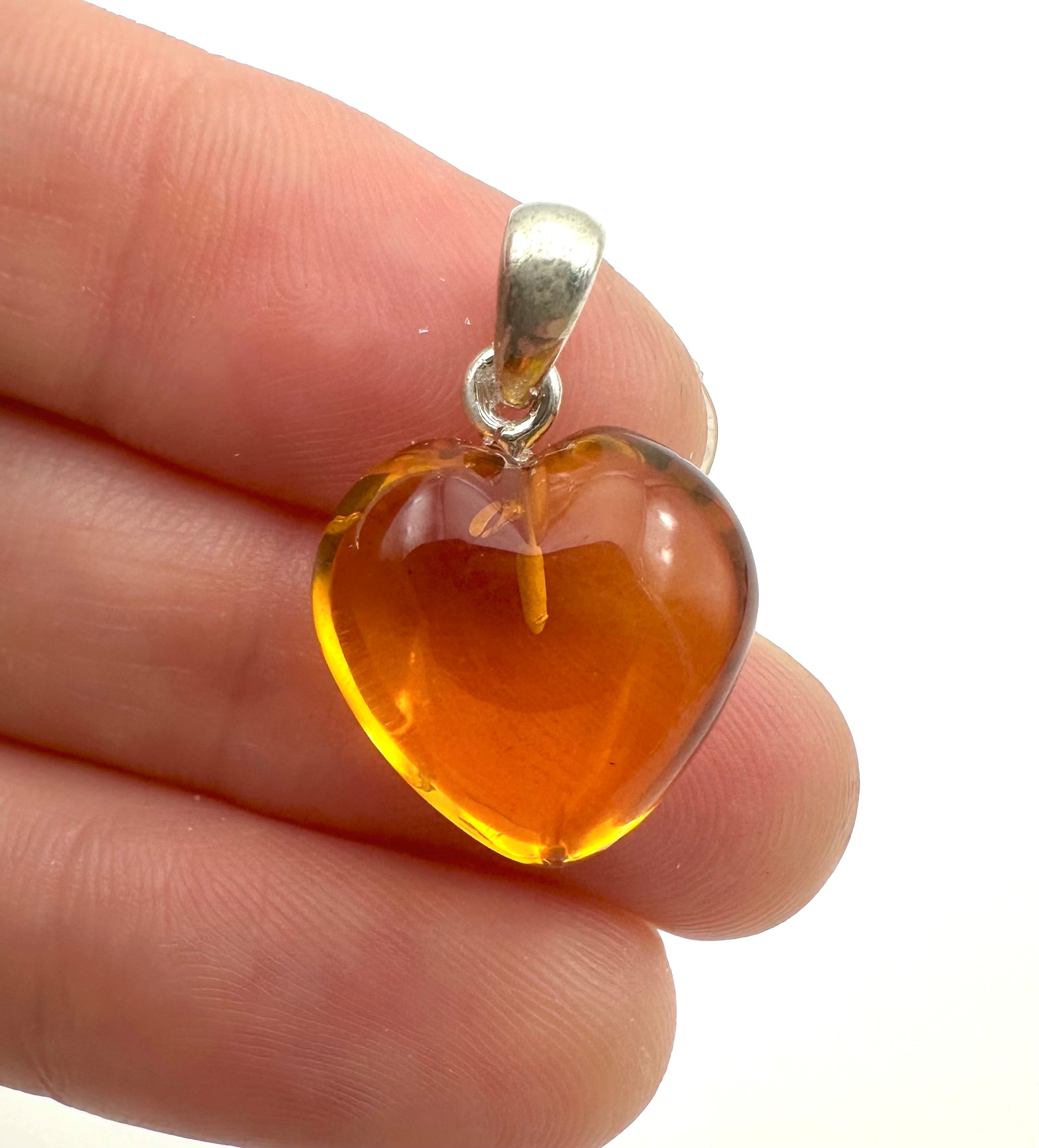 Silver amber pendant