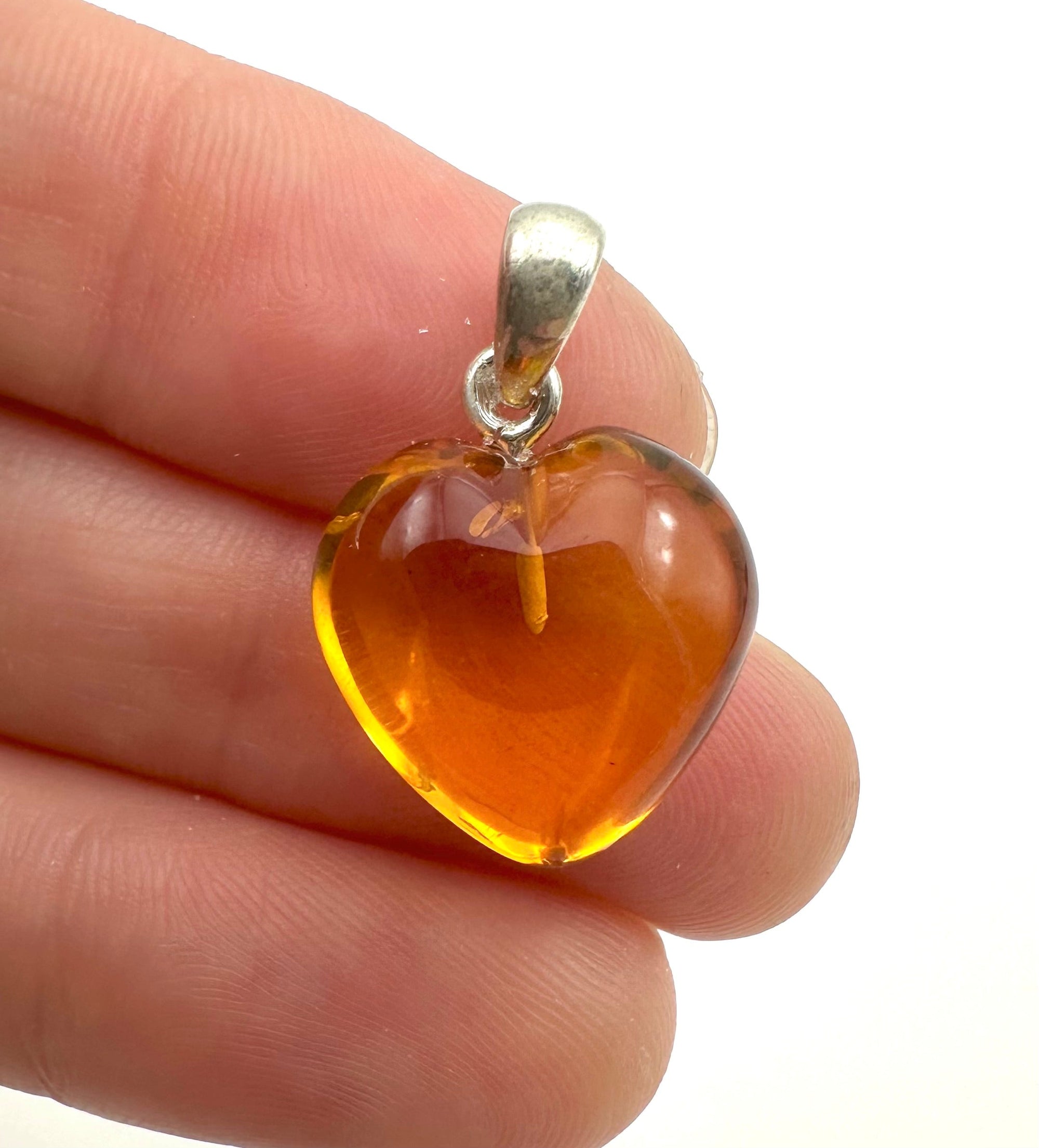 Silver amber pendant