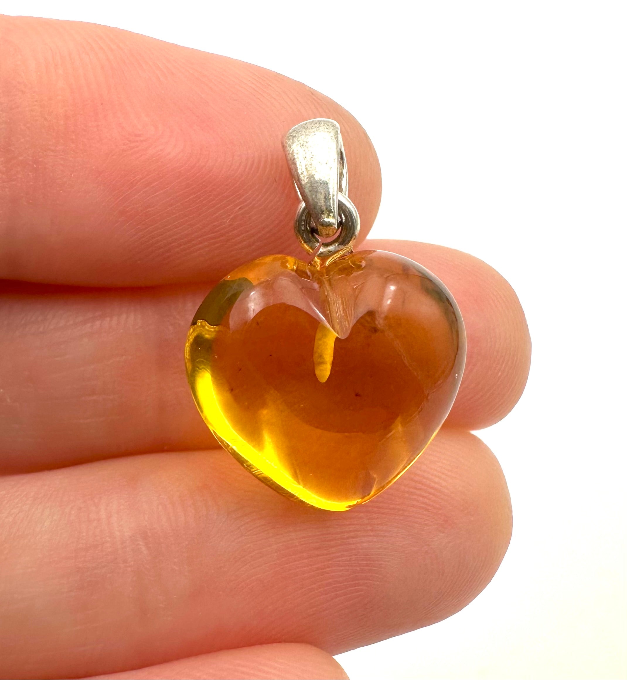 Silver amber pendant