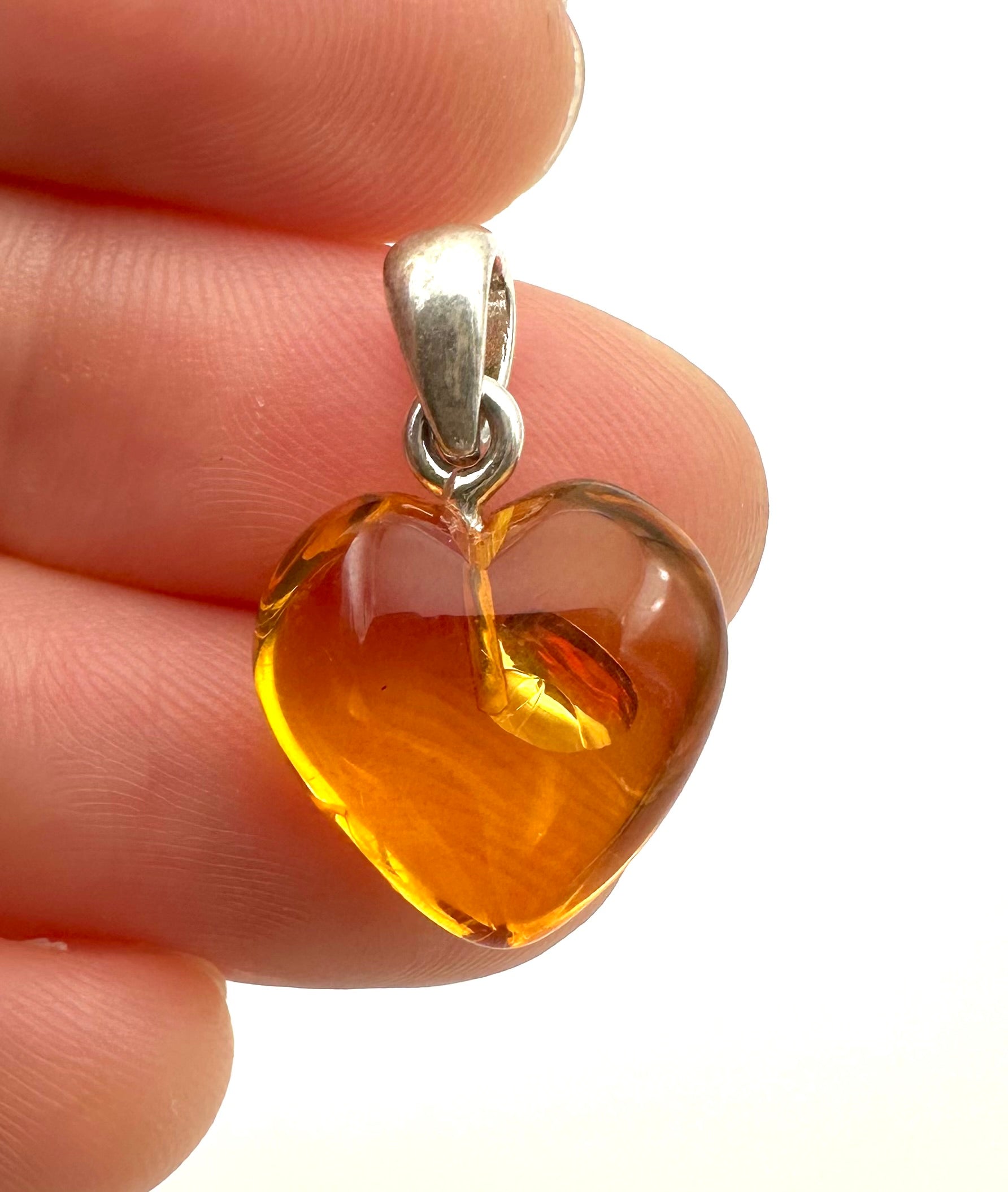 Silver amber pendant
