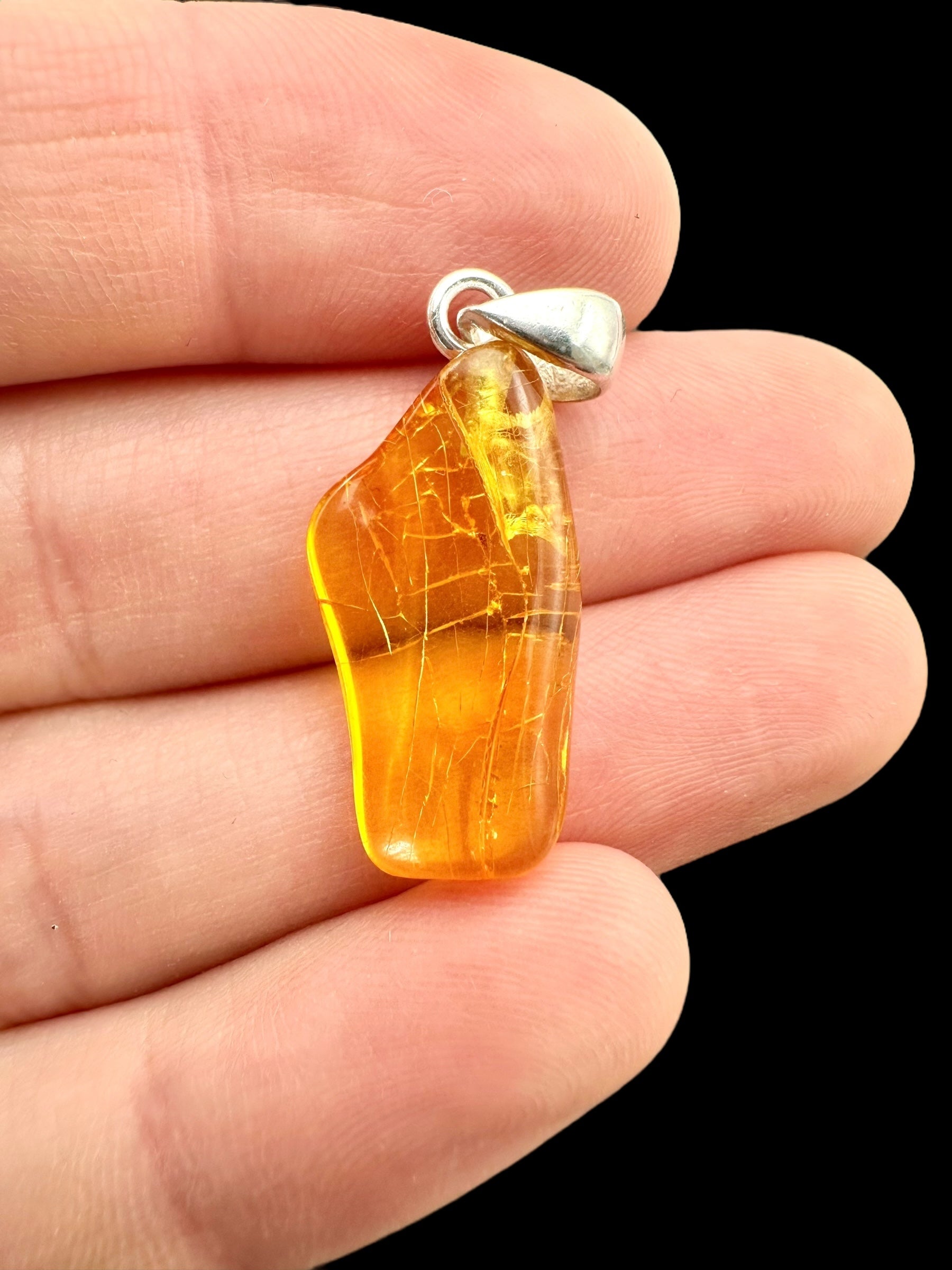 Silver amber pendant