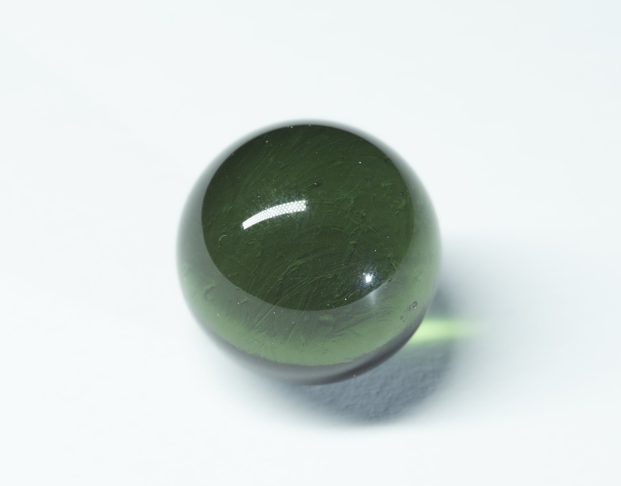 Faceted moldavite 25,45ct – sphere