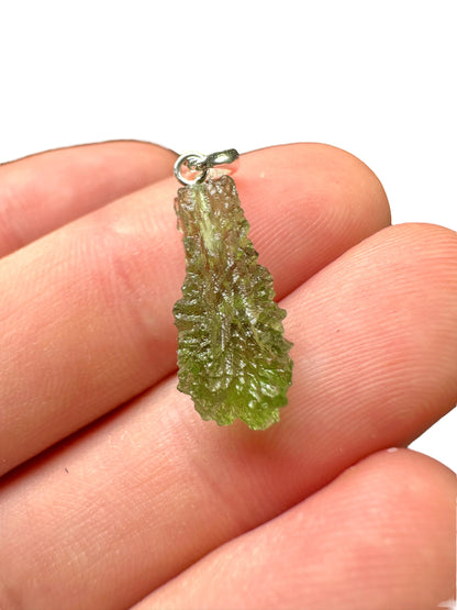 Silver moldavite pendant