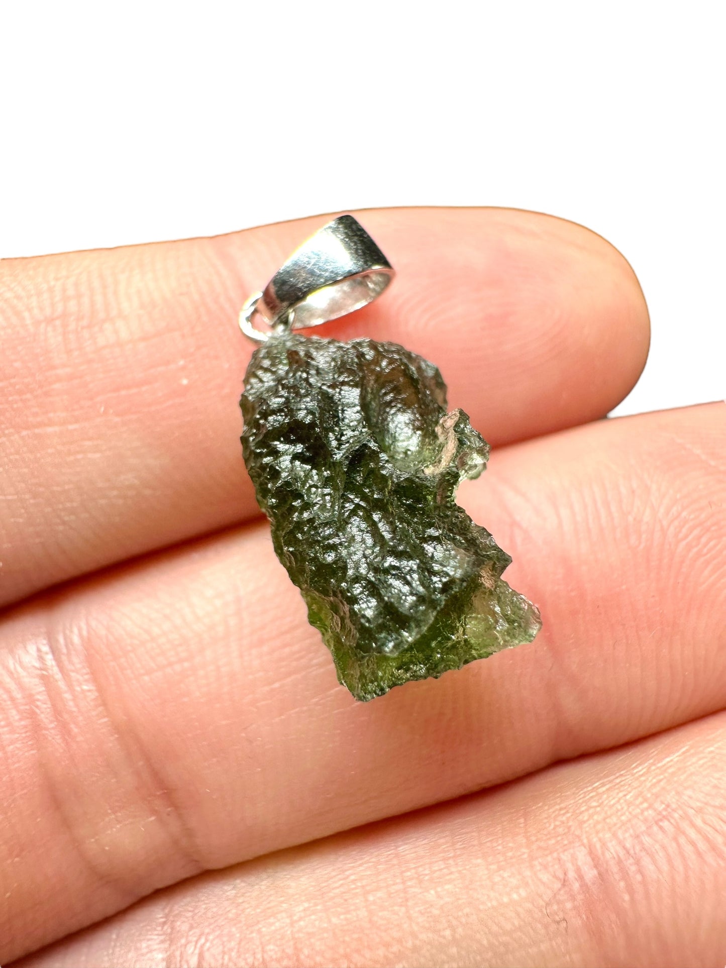Silver moldavite pendant