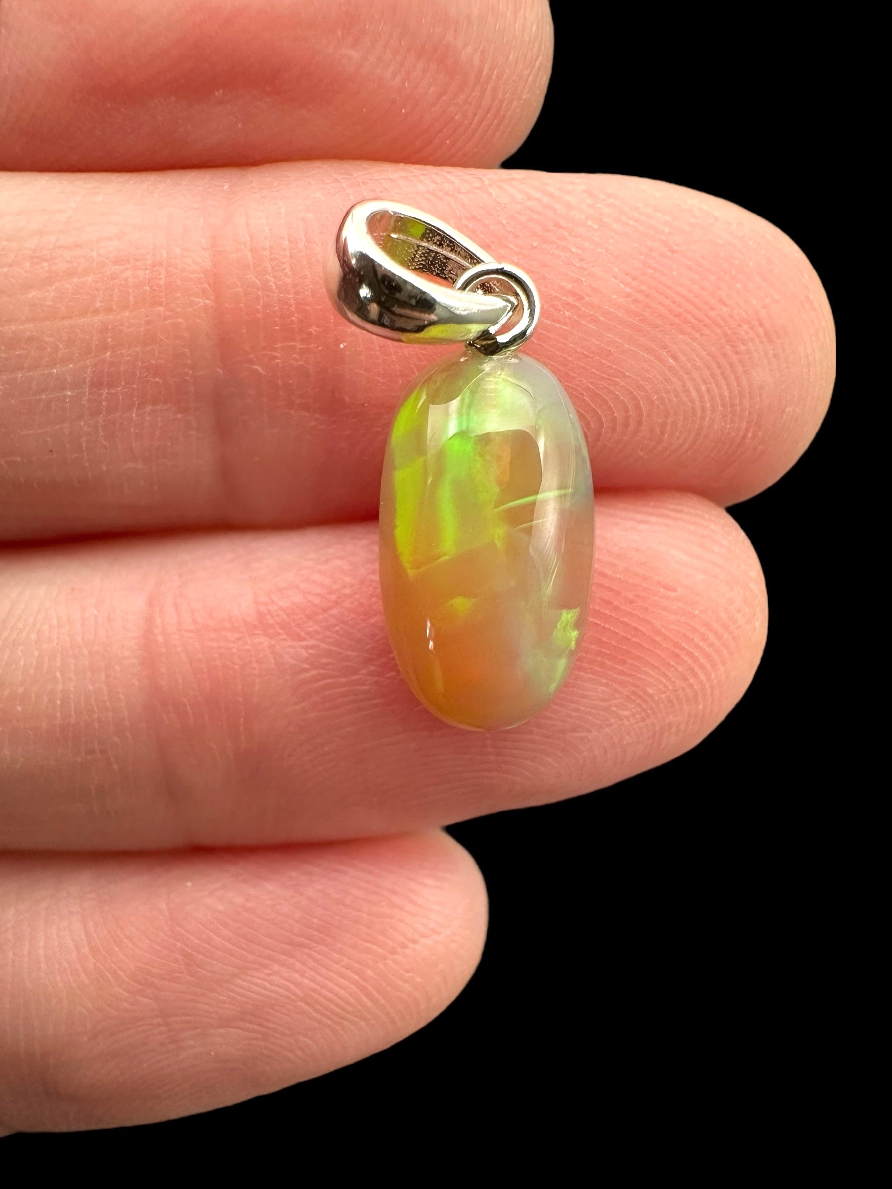 Silver faceted precious opal pendant