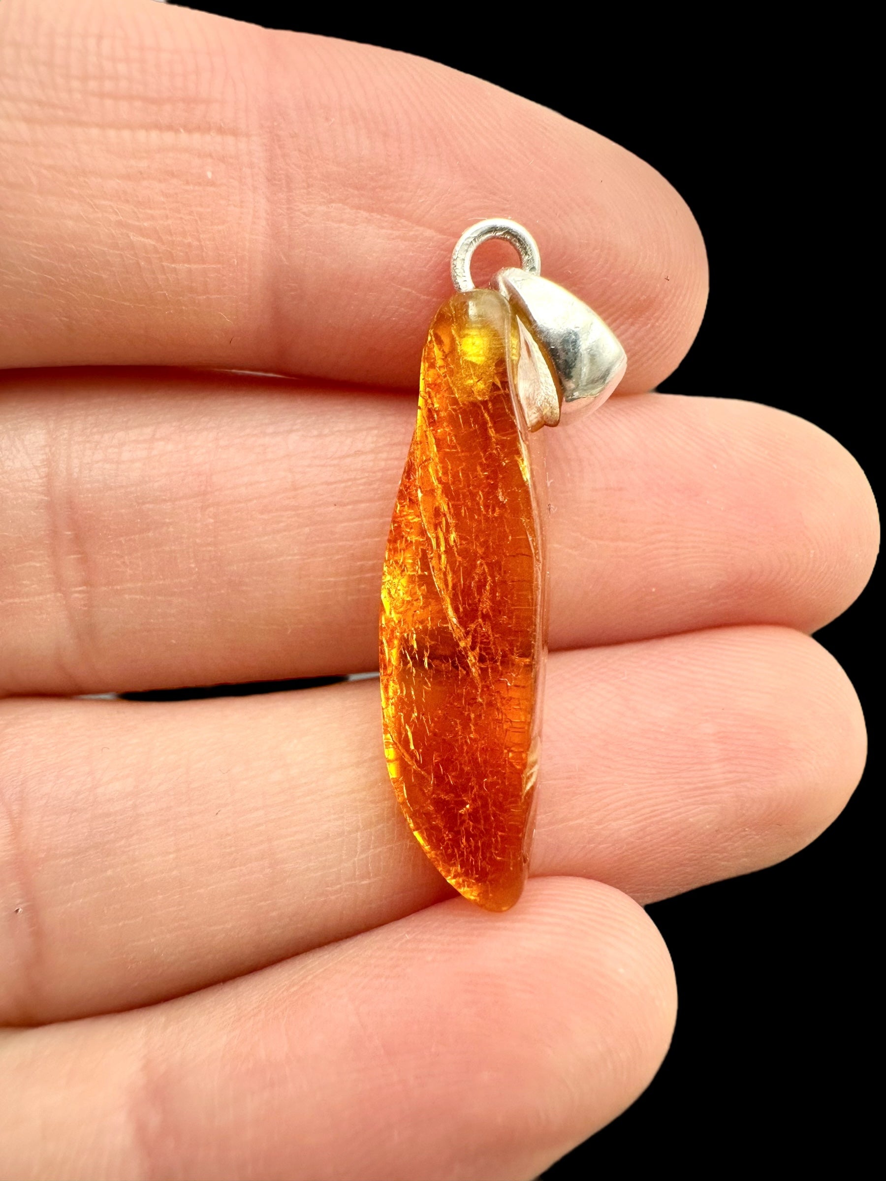 Silver amber pendant