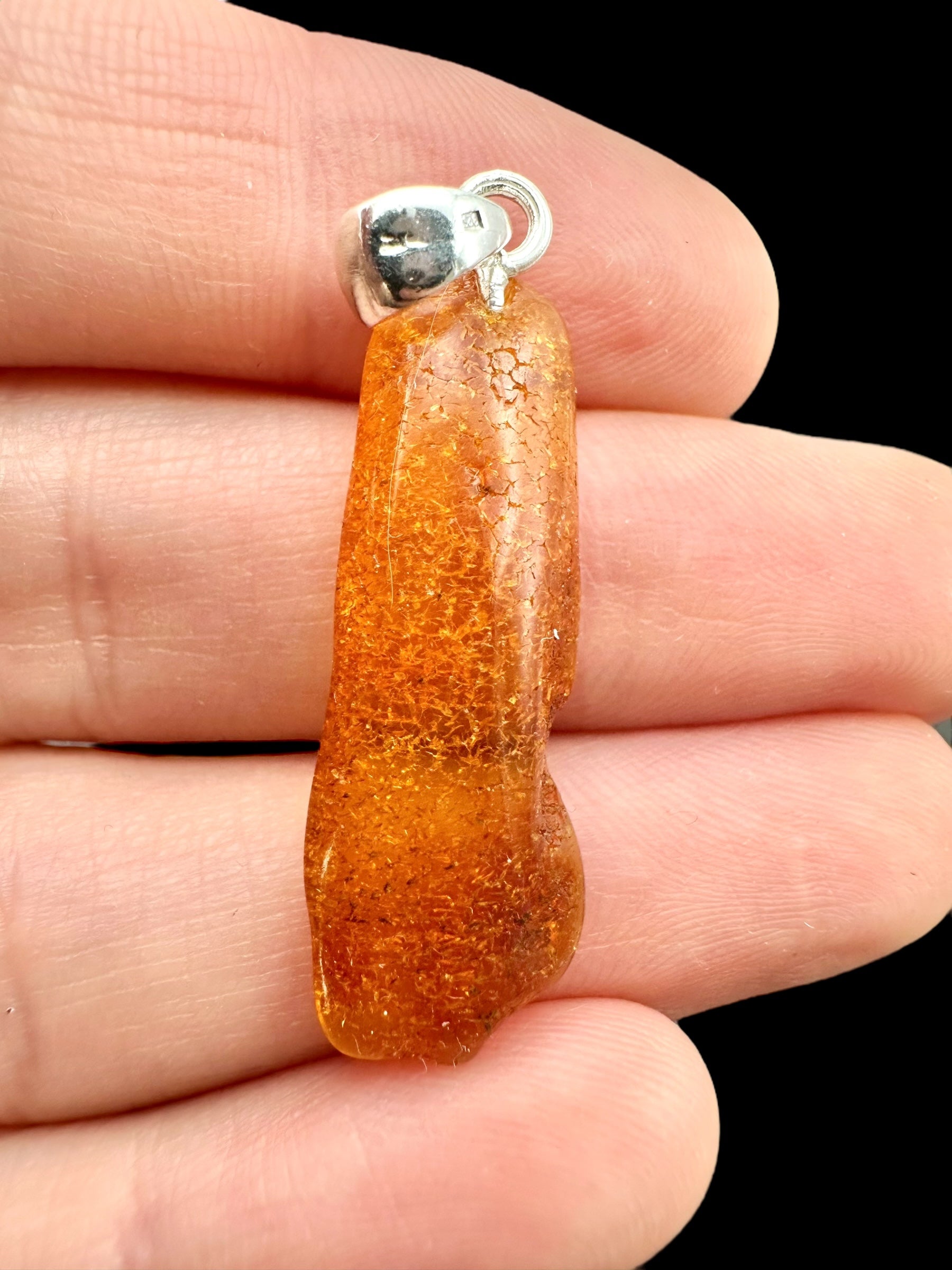 Silver amber pendant