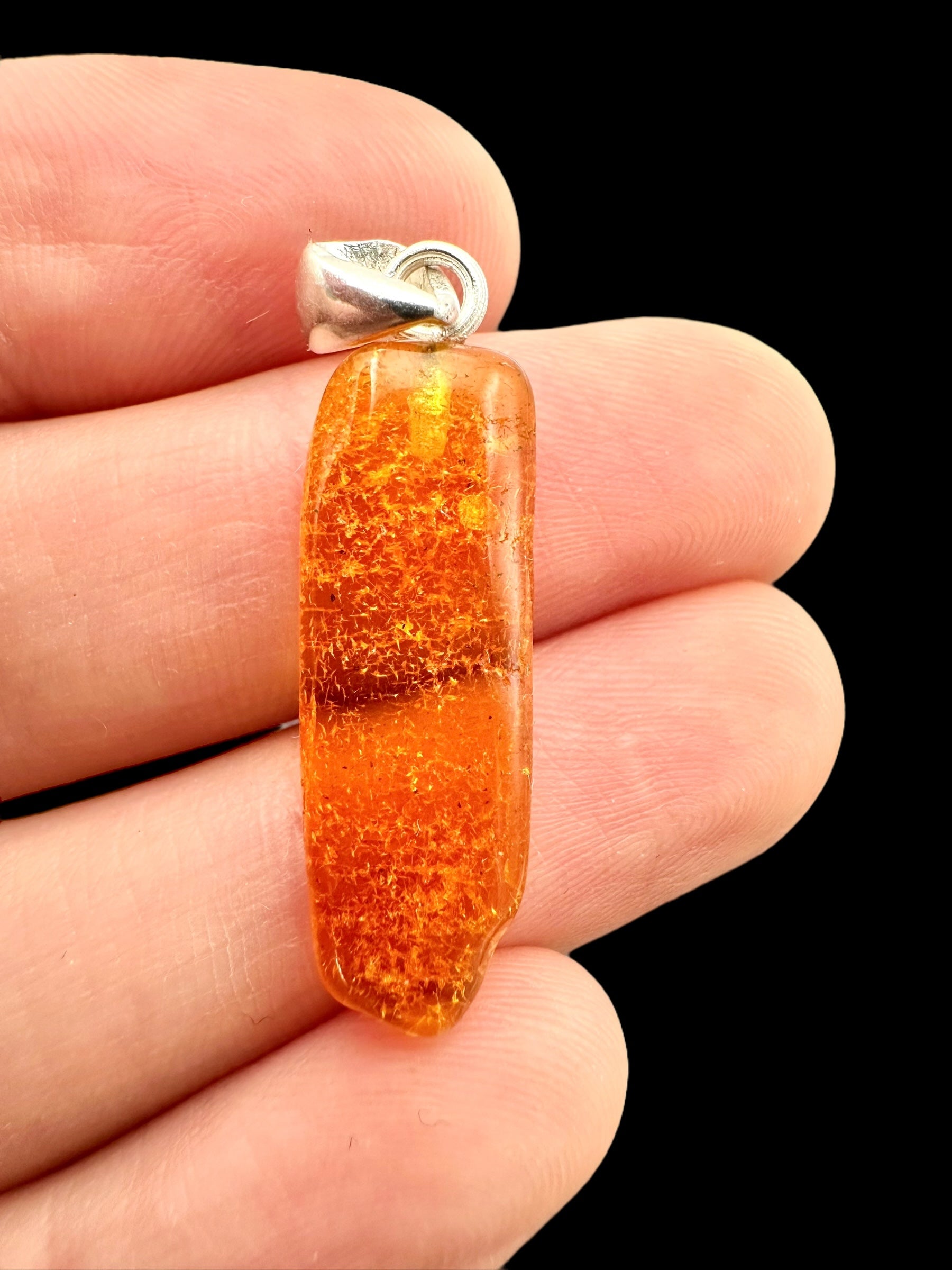 Silver amber pendant