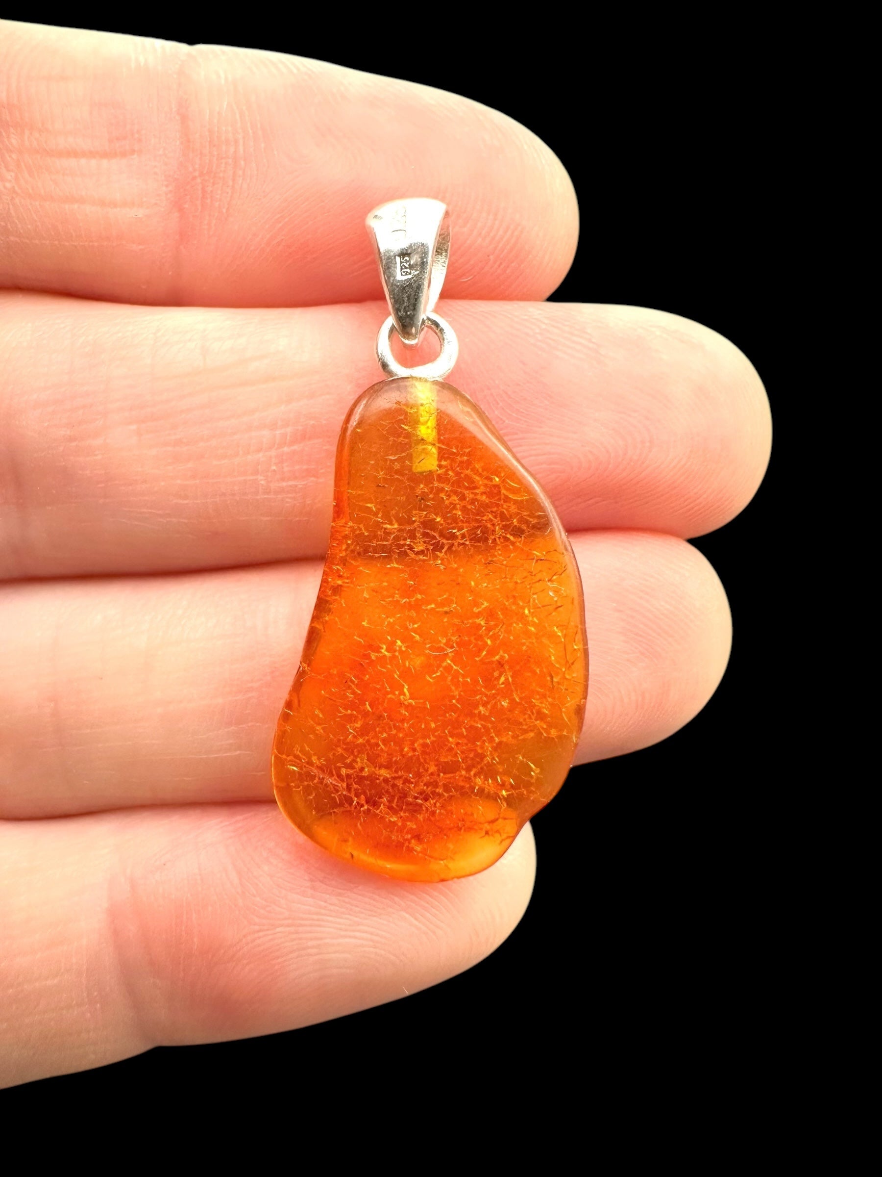 Silver amber pendant