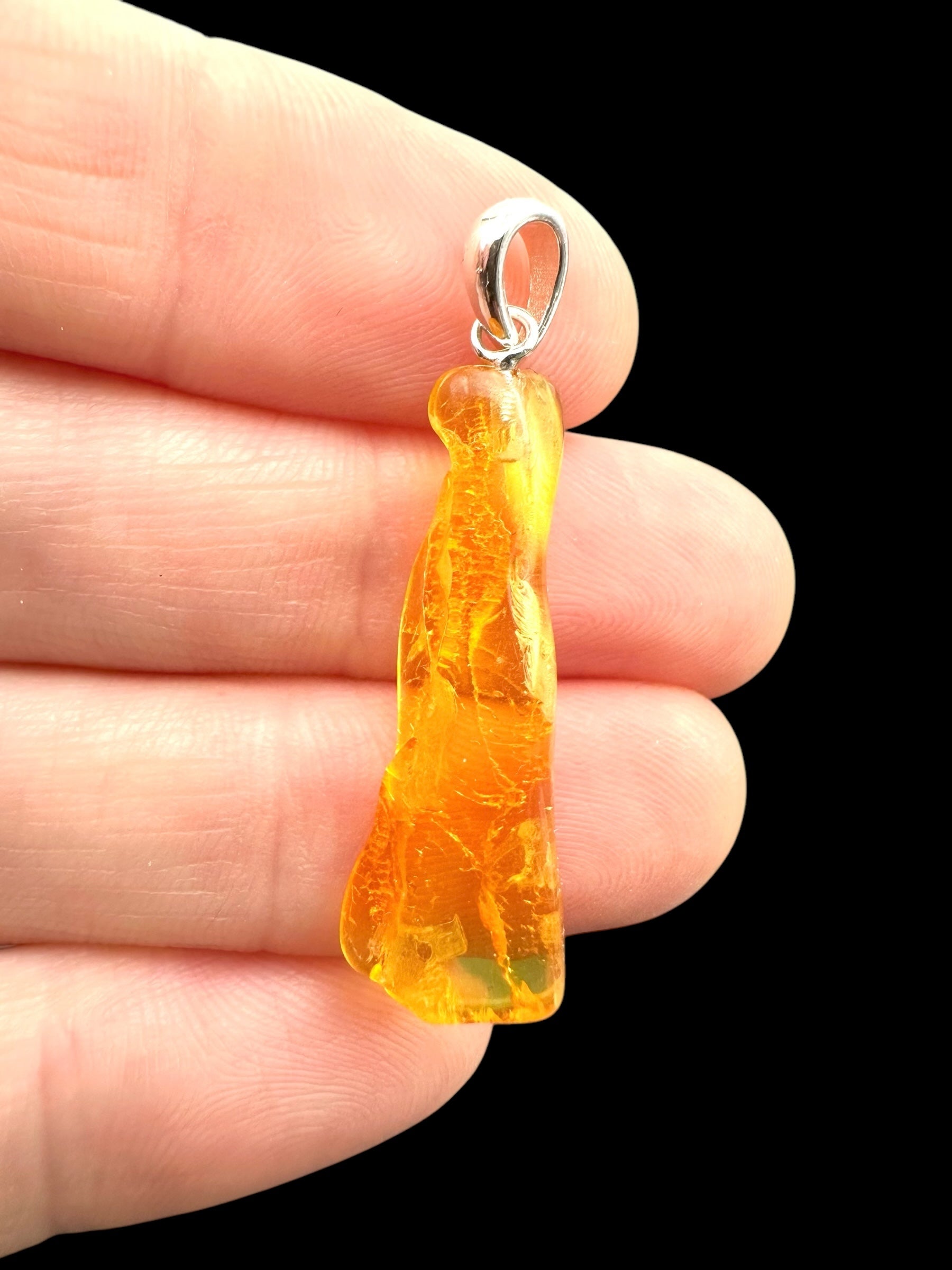 Silver amber pendant