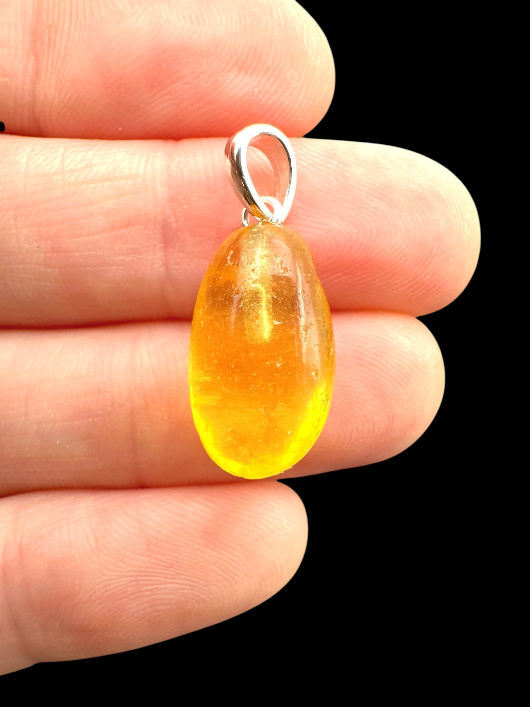 Silver amber pendant