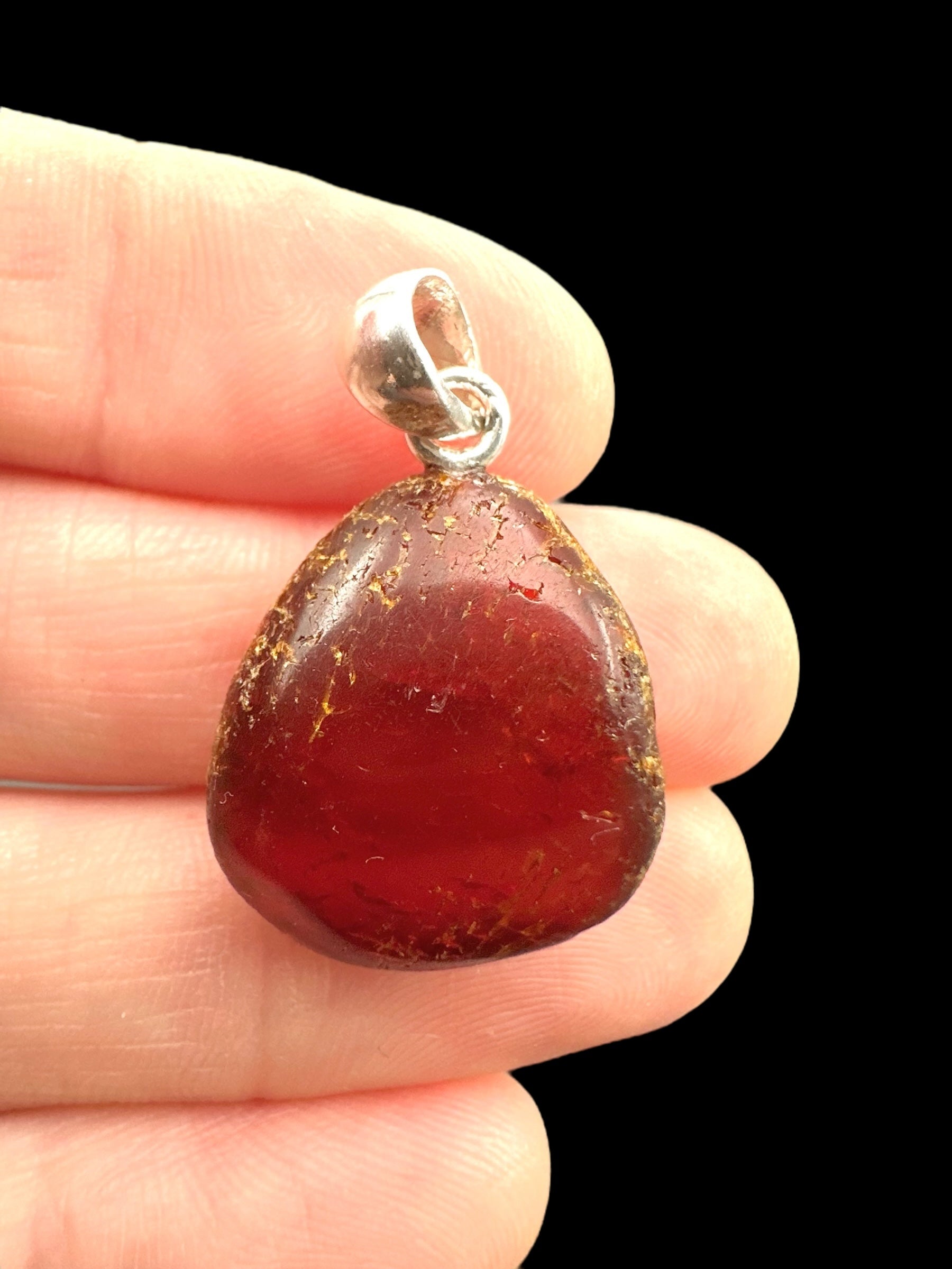 Silver amber pendant