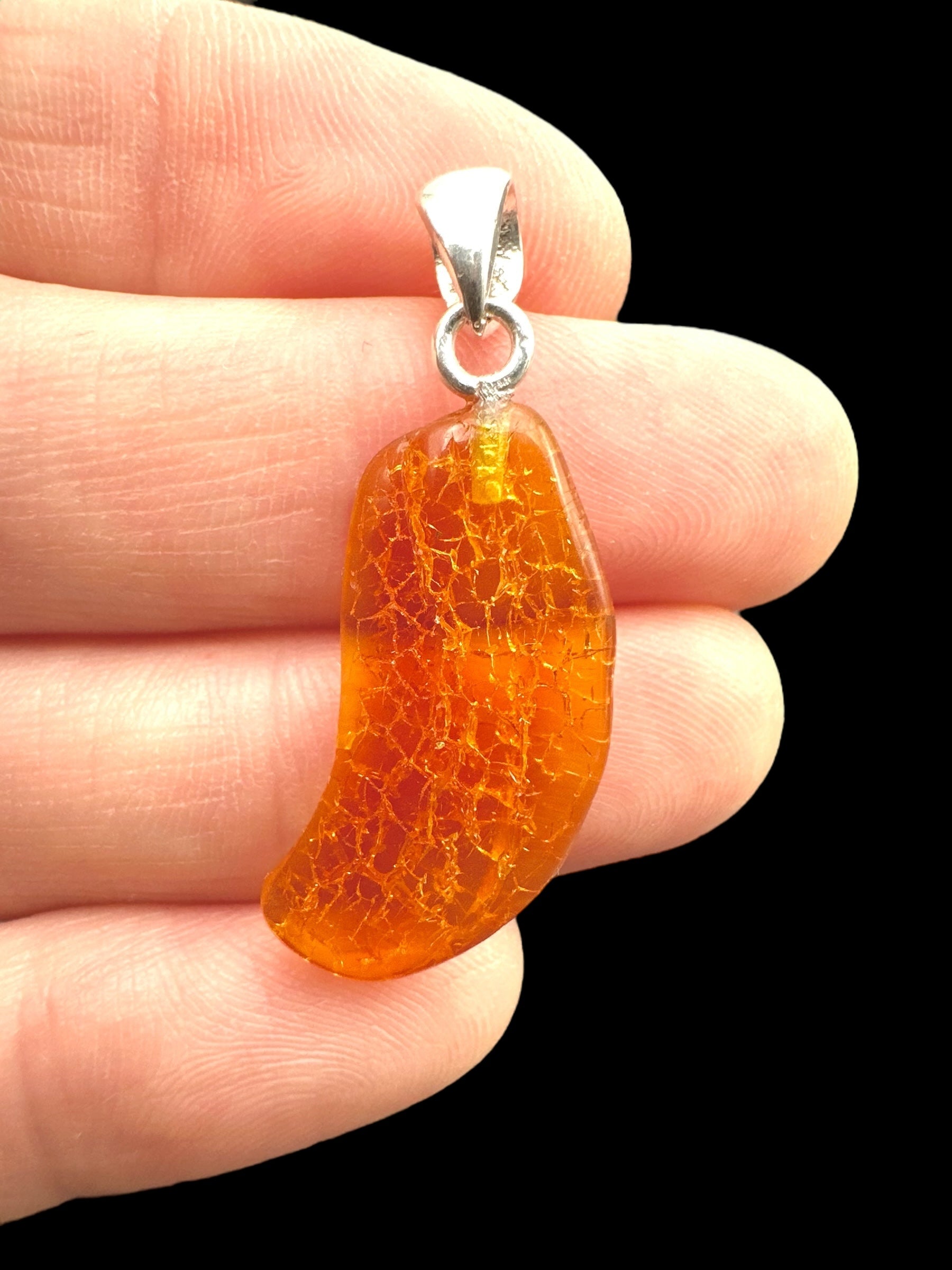 Silver amber pendant