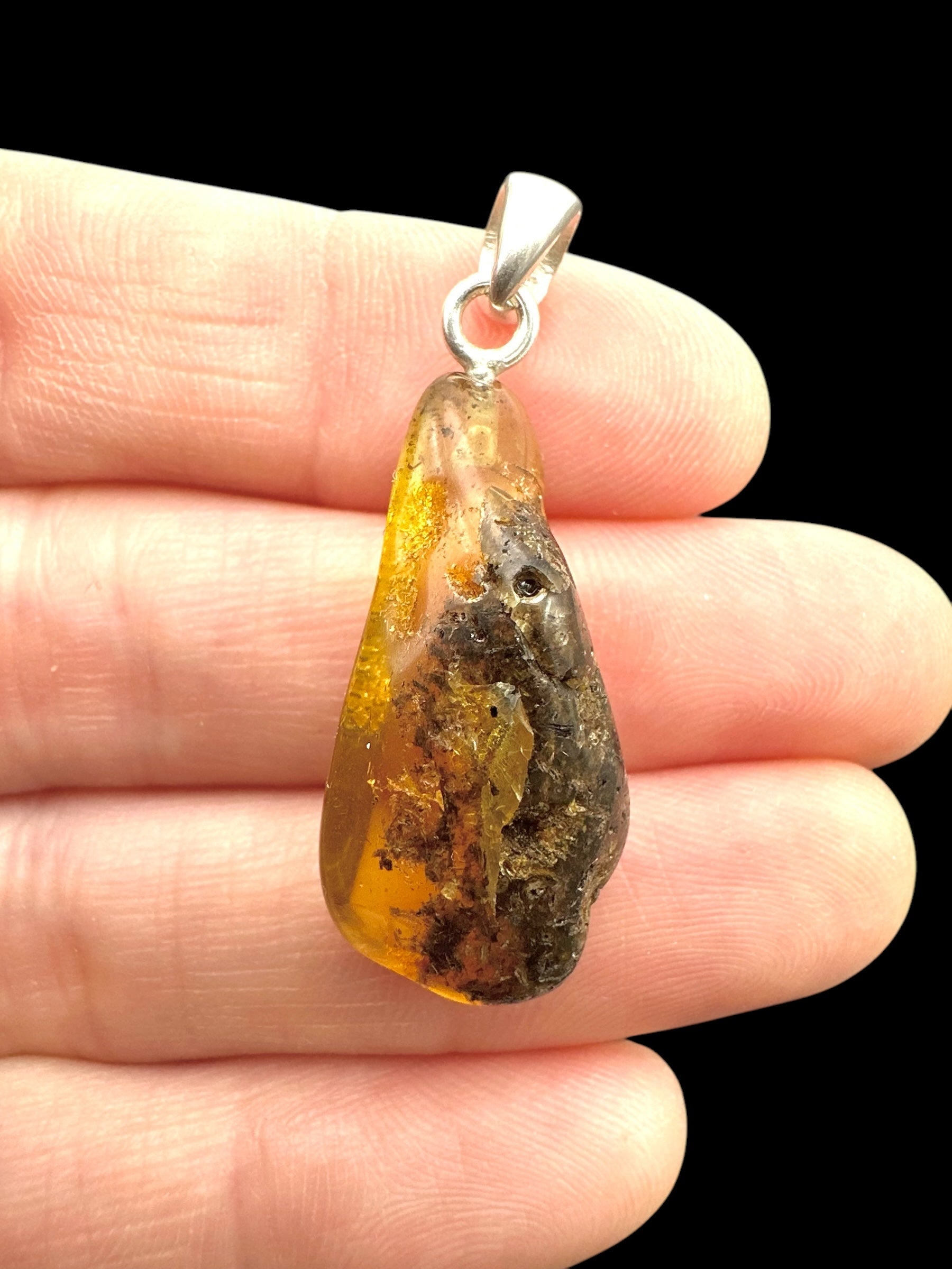 Silver amber pendant