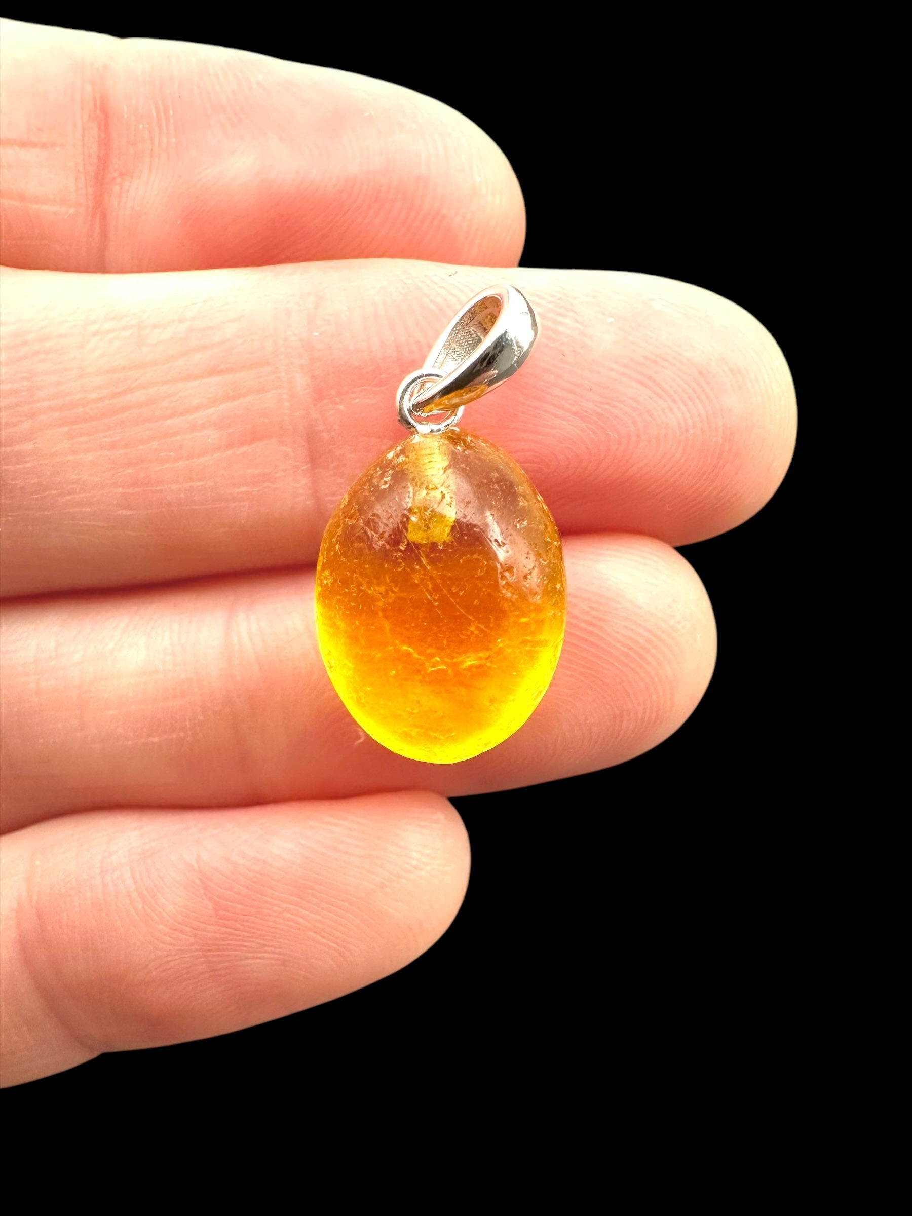 Silver amber pendant