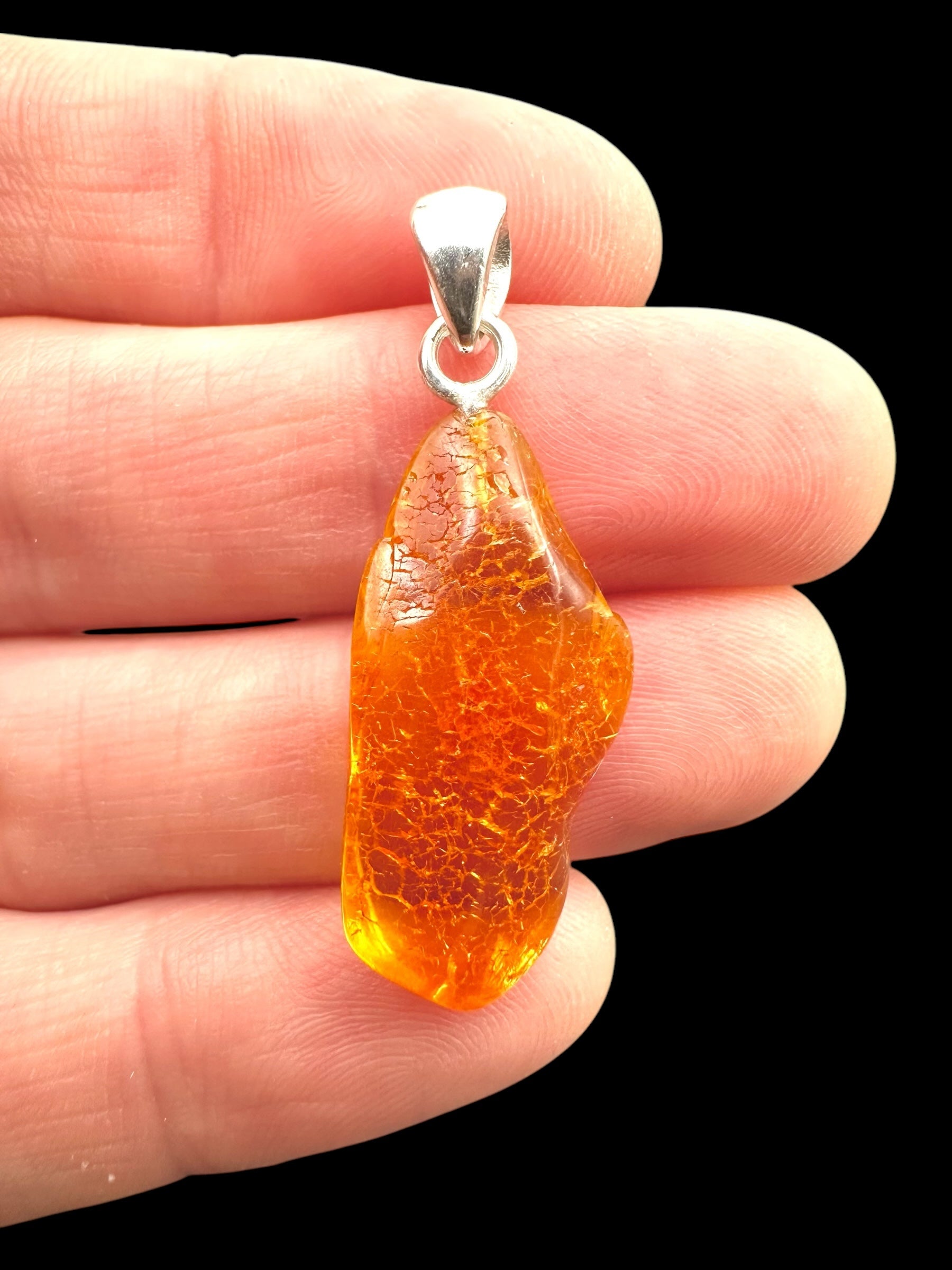 Silver amber pendant