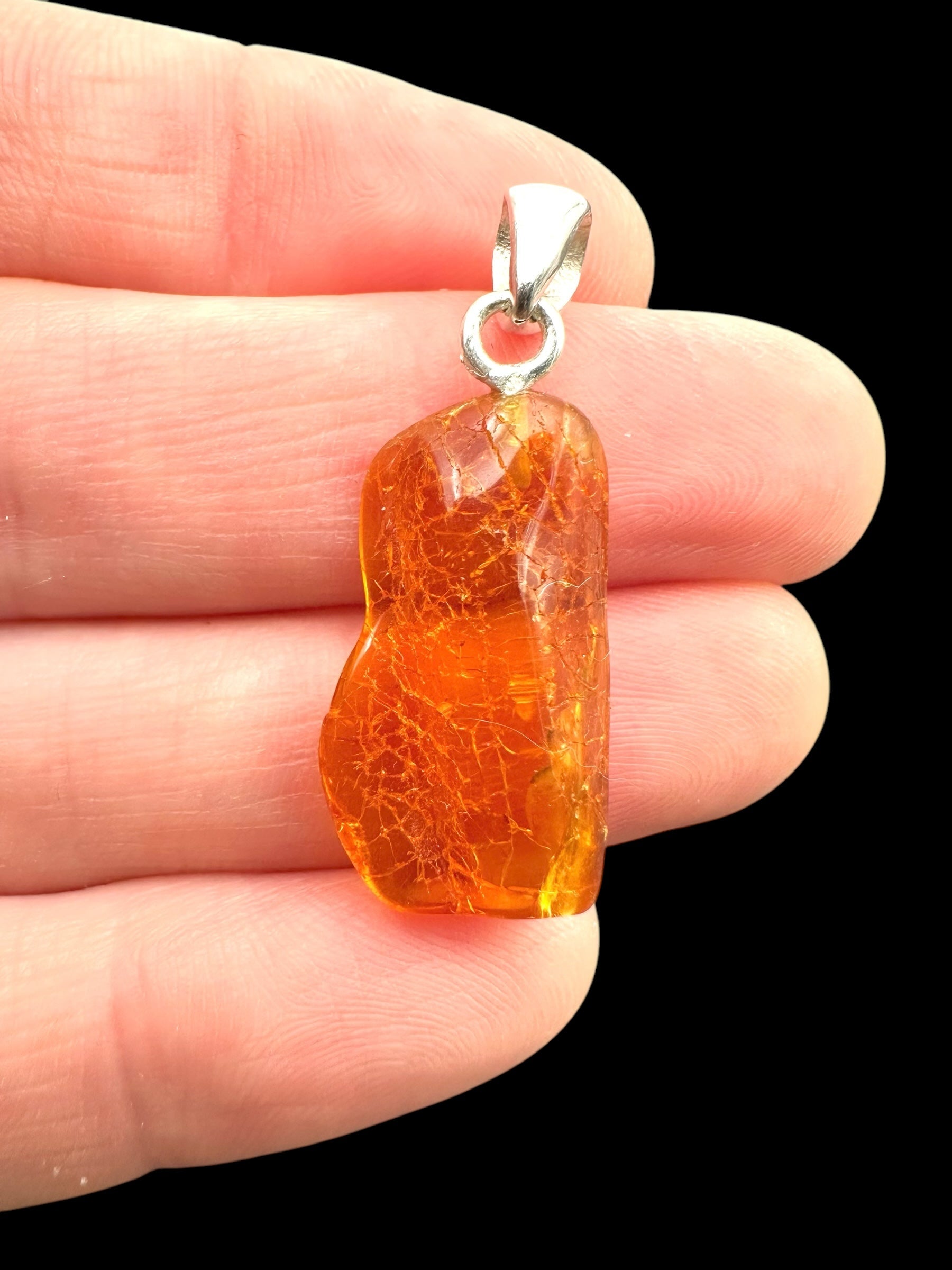 Silver amber pendant