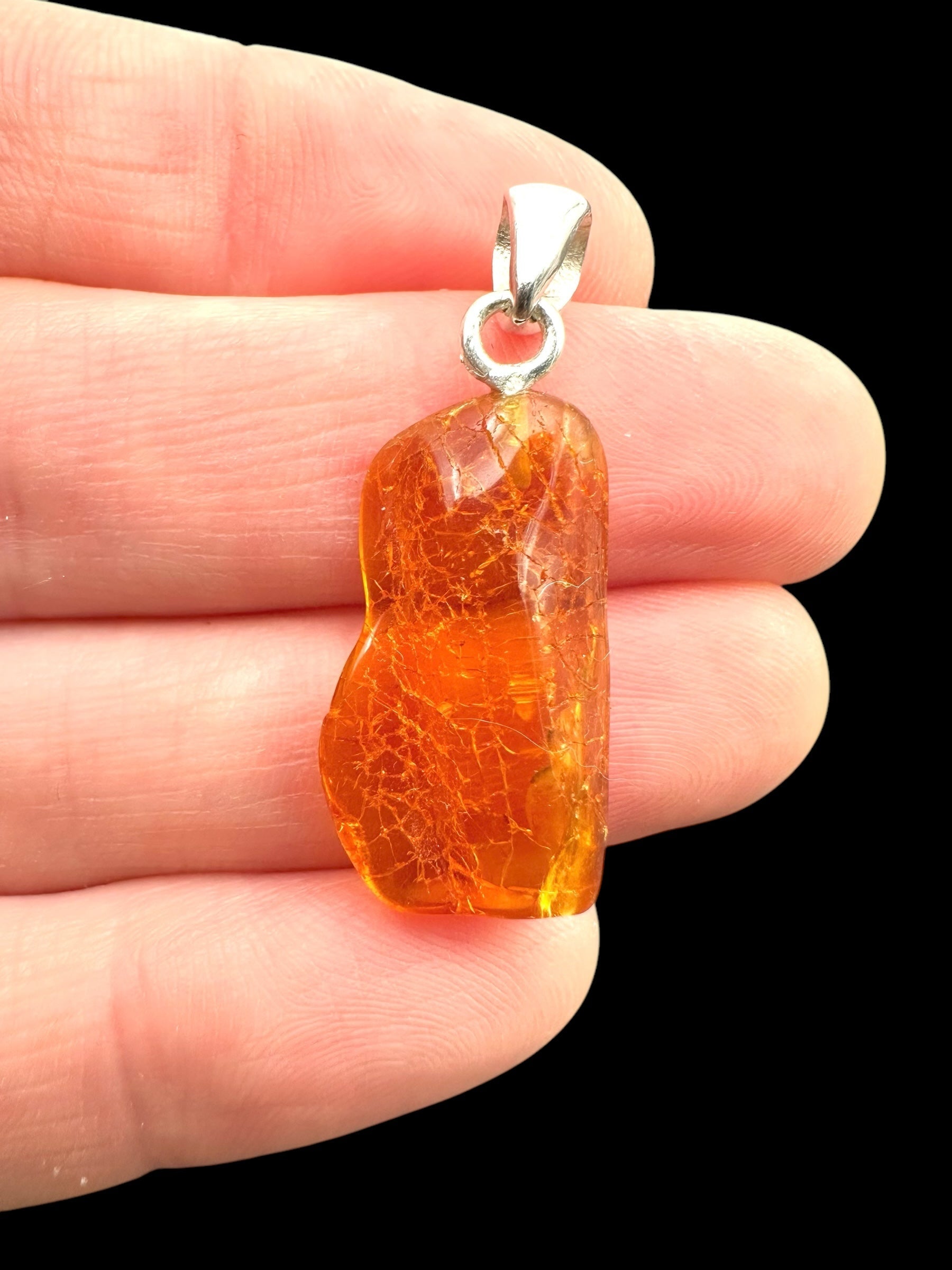 Silver amber pendant