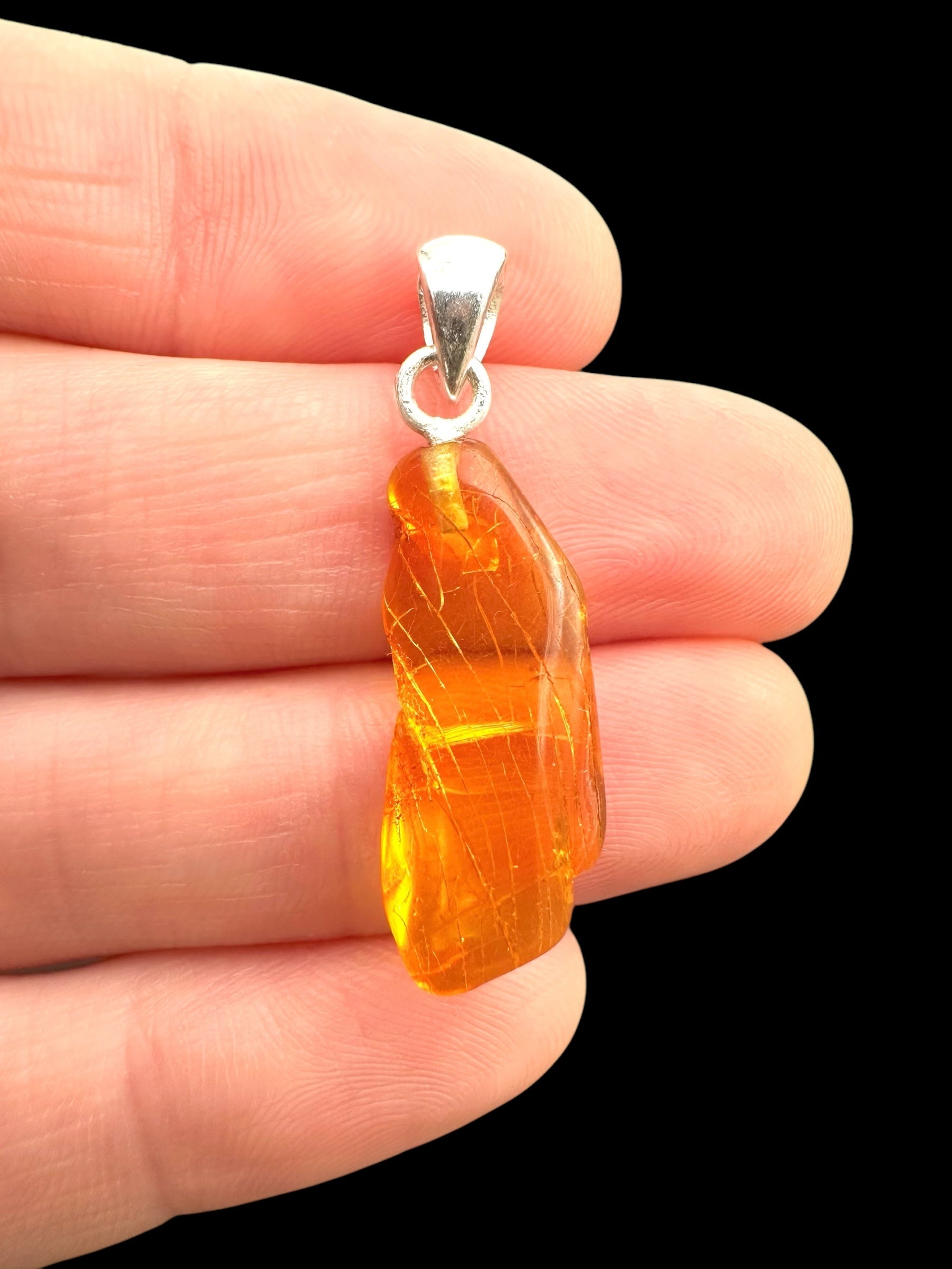 Silver amber pendant