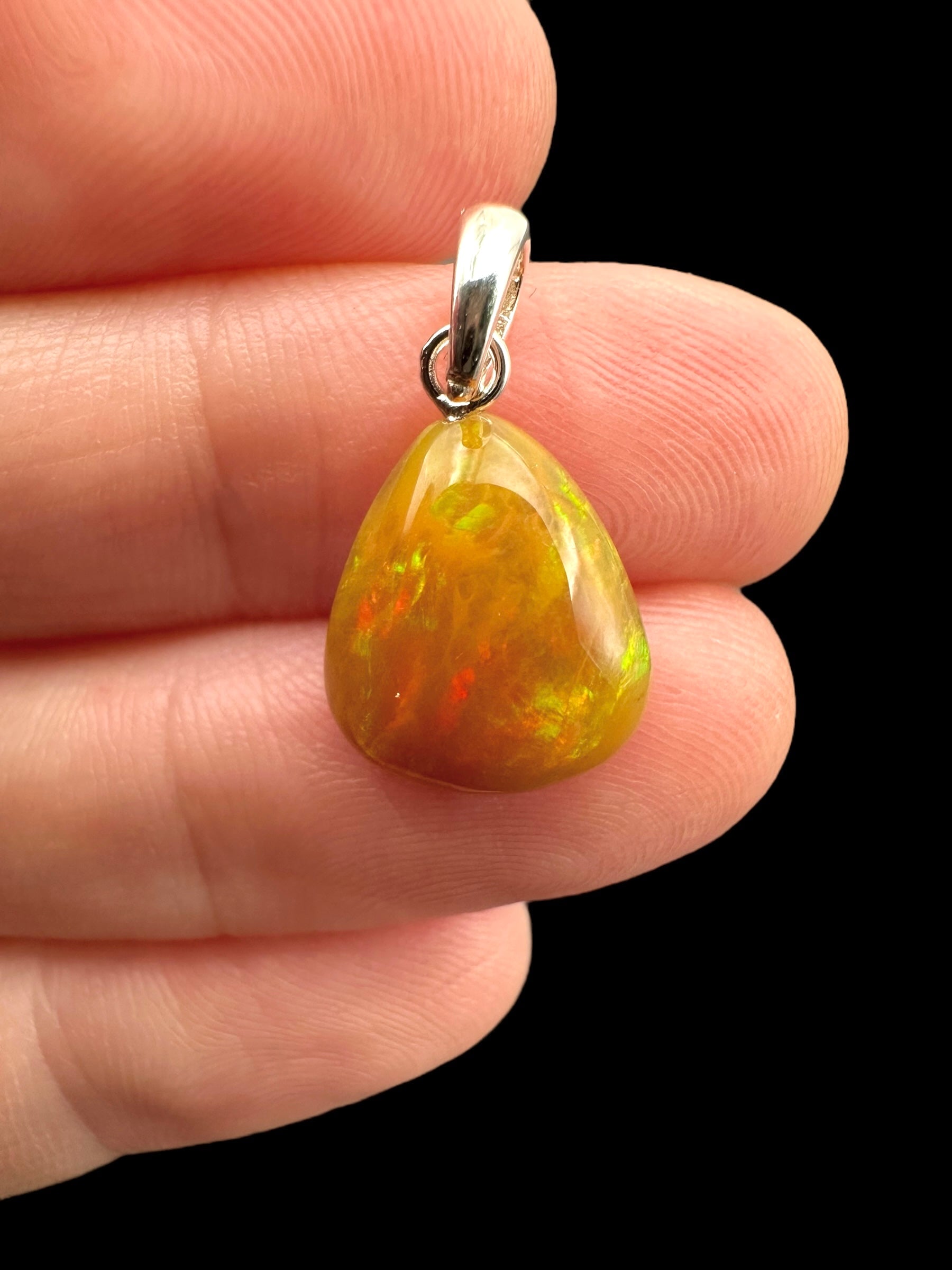 Silver faceted precious opal pendant