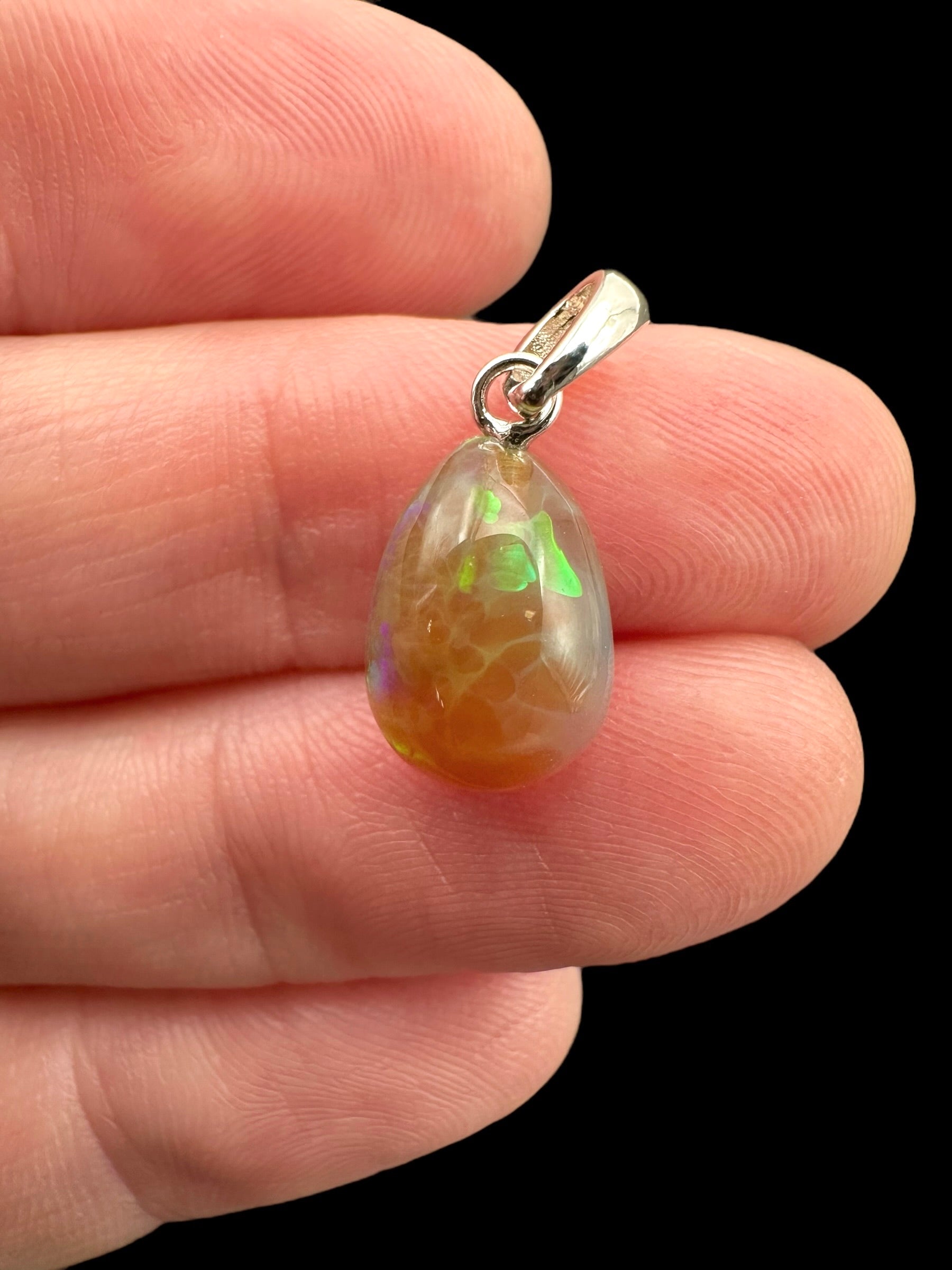 Silver faceted precious opal pendant