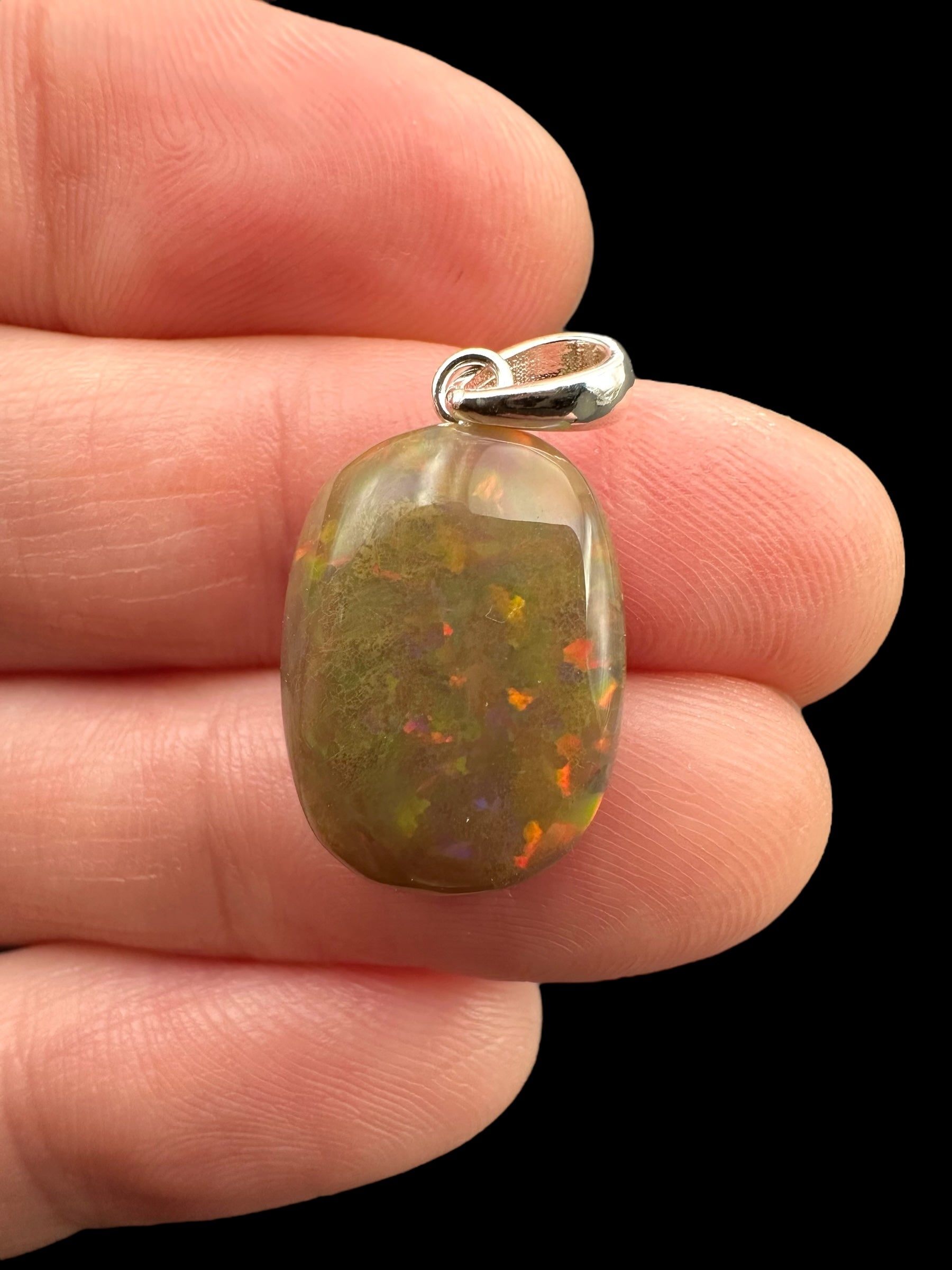 Silver faceted precious opal pendant