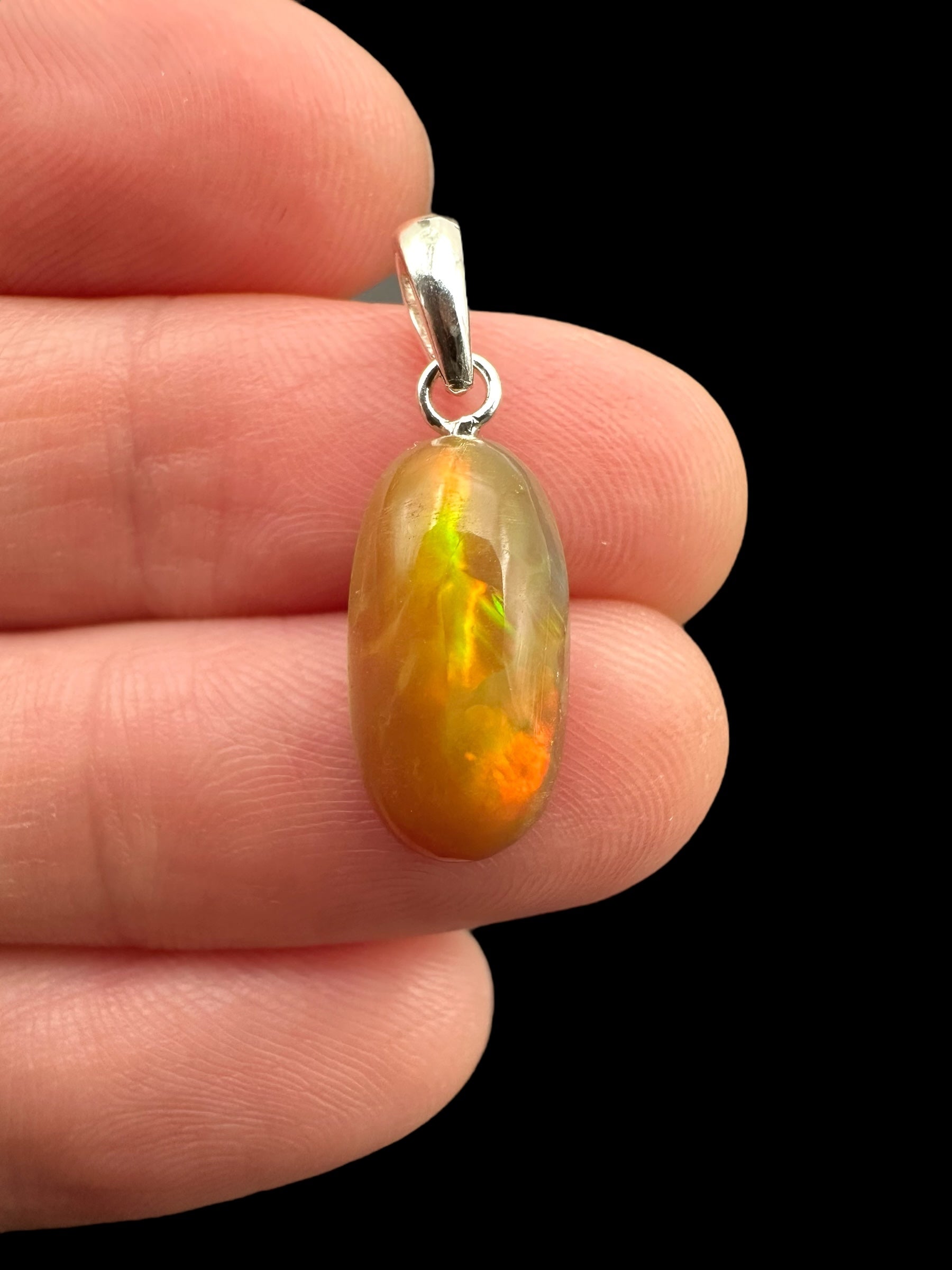 Silver faceted precious opal pendant
