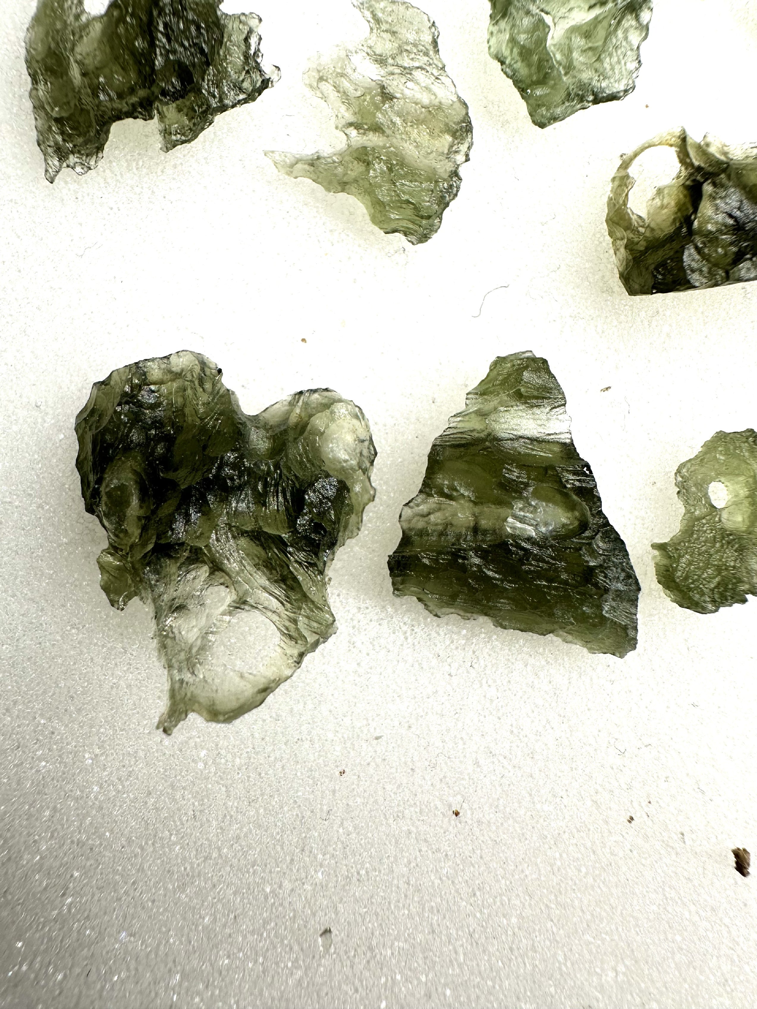 Moldavites with natural holes – 22,7g - XXXX21