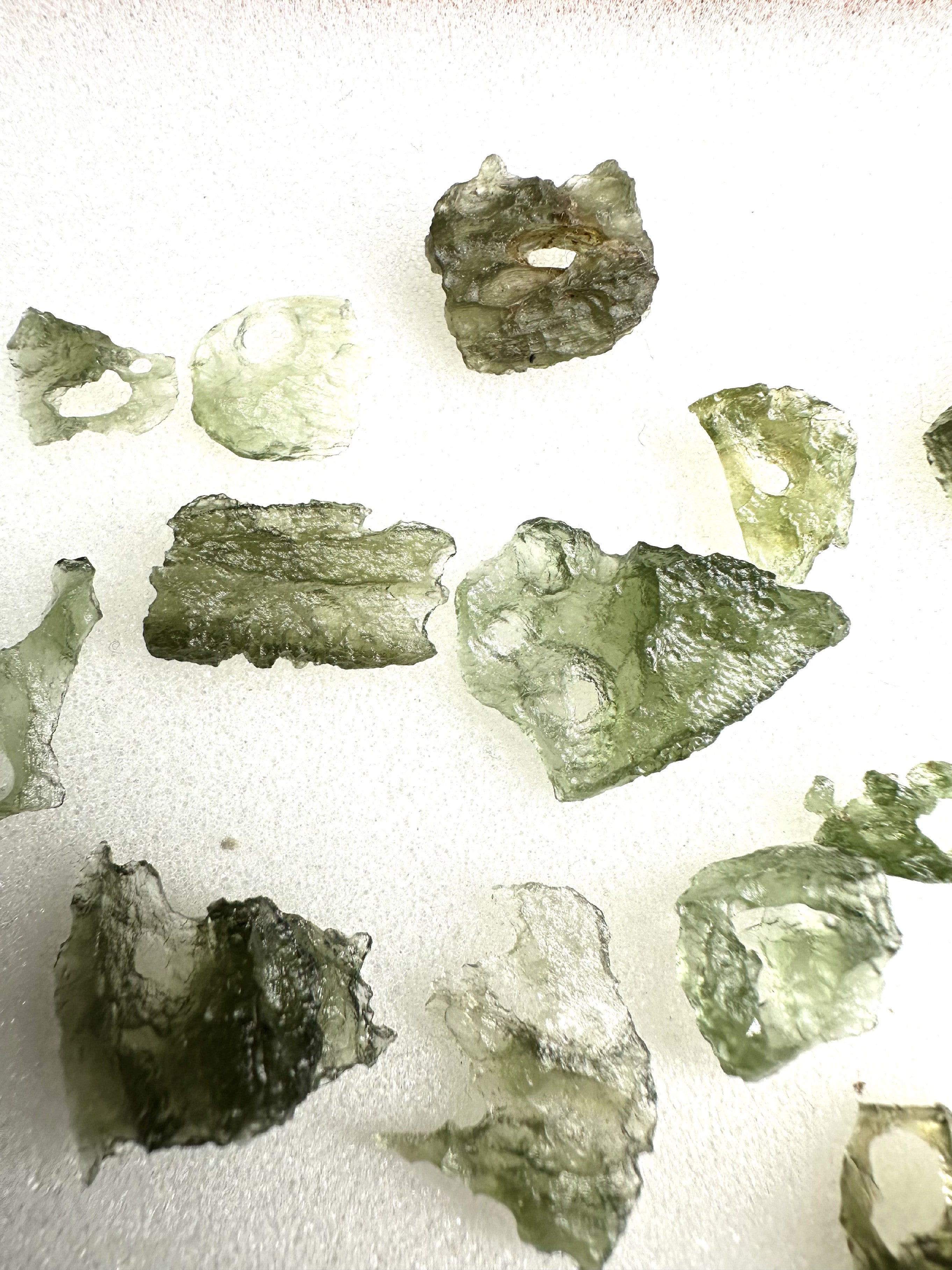 Moldavites with natural holes – 22,7g - XXXX21