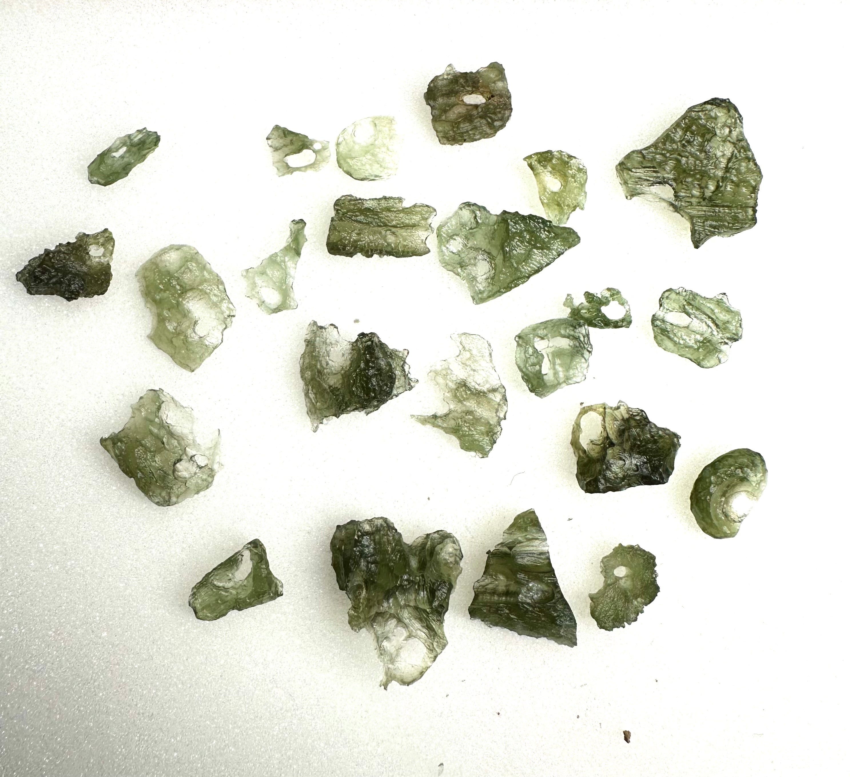 Moldavites with natural holes – 22,7g