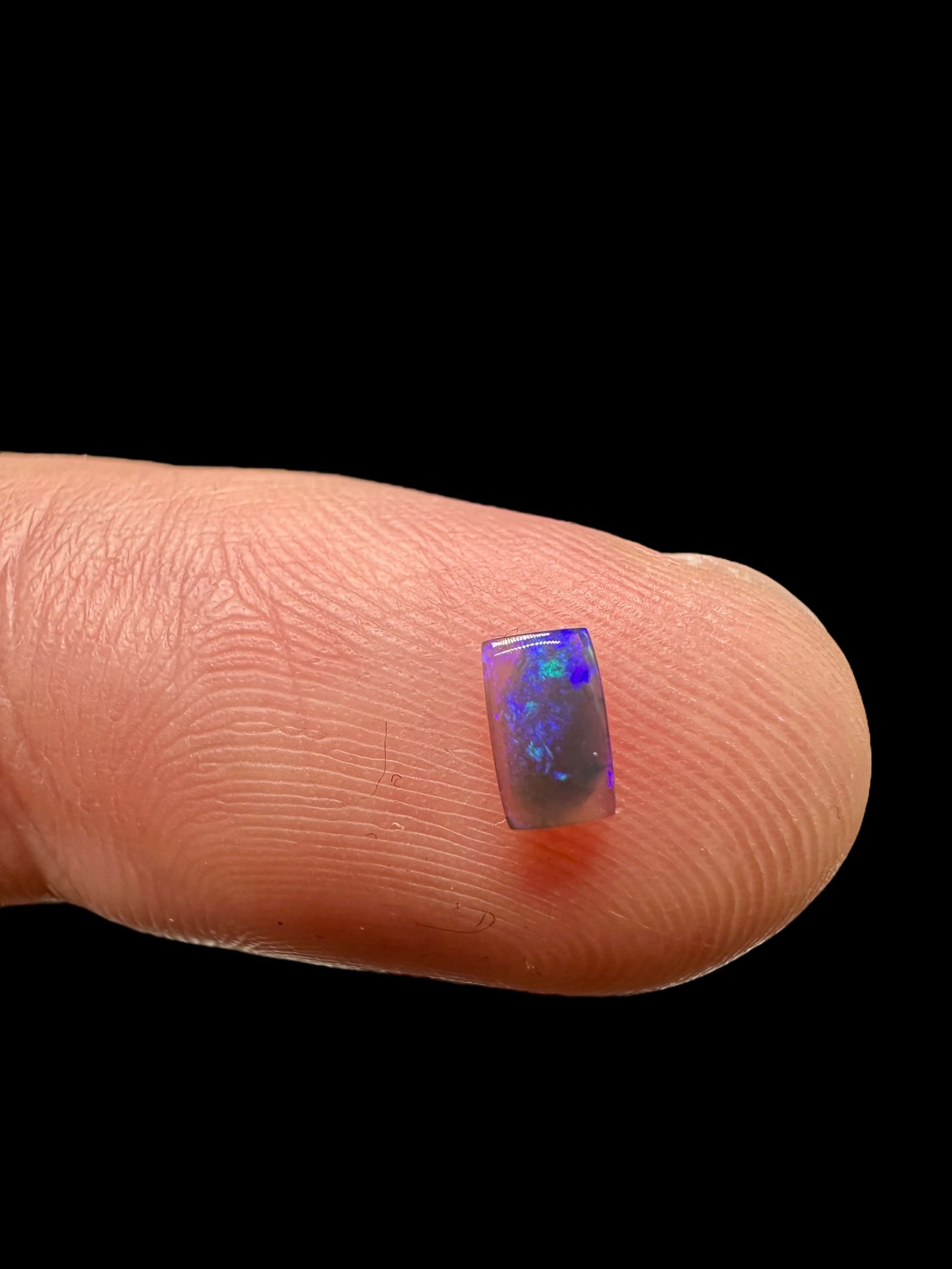 Australian black opal 0,25ct – Cabochon – Lightning Ridge, Australia - AO024