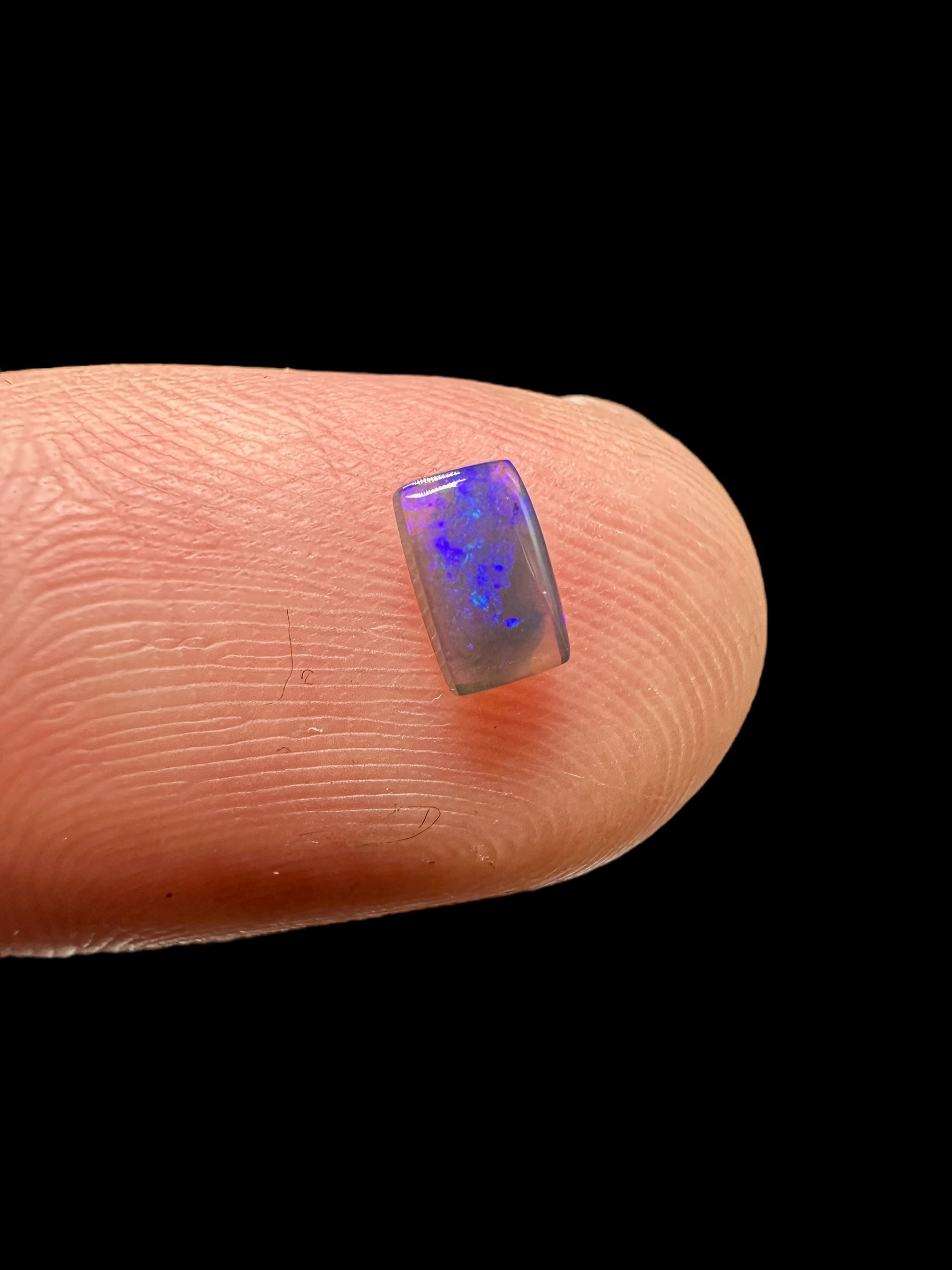 Australian black opal 0,25ct – Cabochon – Lightning Ridge, Australia - AO024