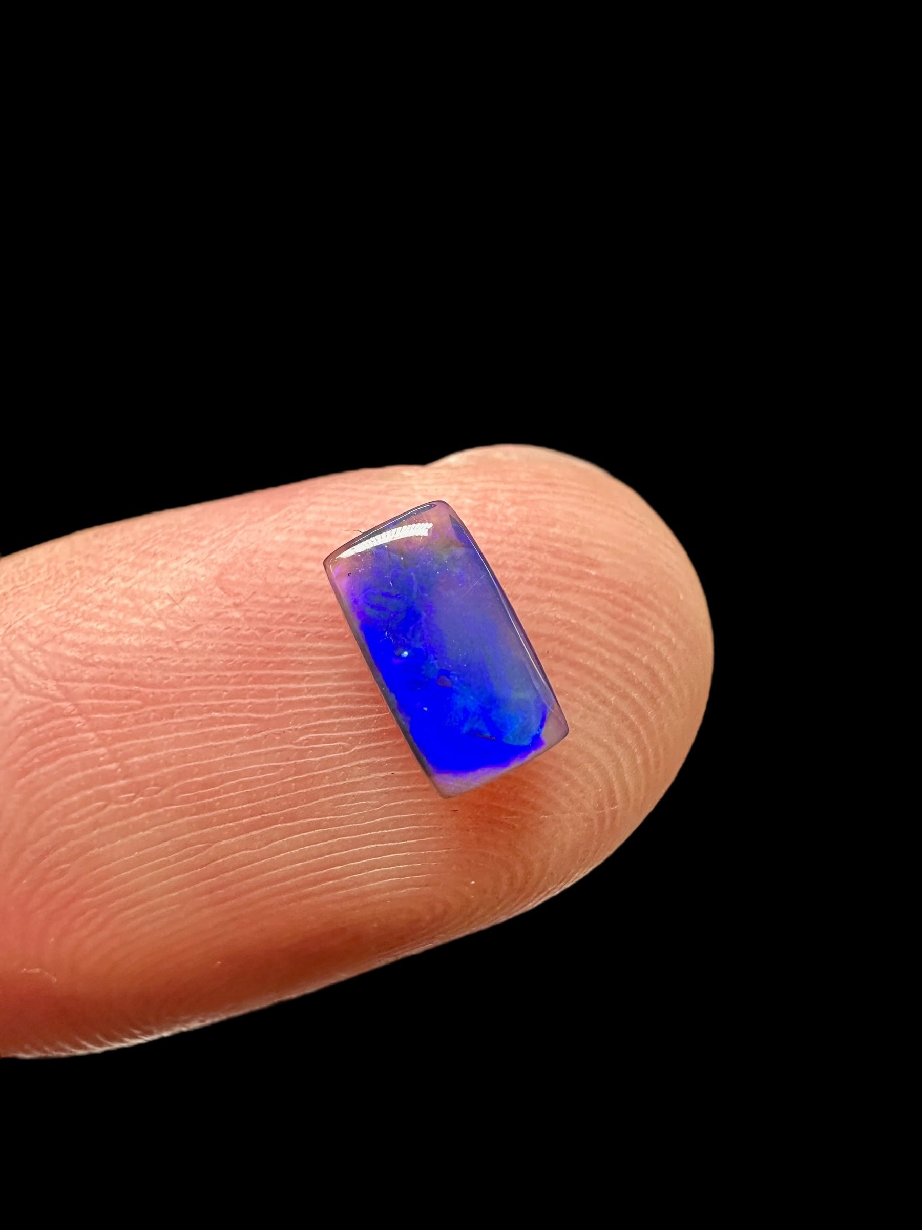 Australian black opal 0,55ct – Cabochon – Lightning Ridge, Australia - AO025