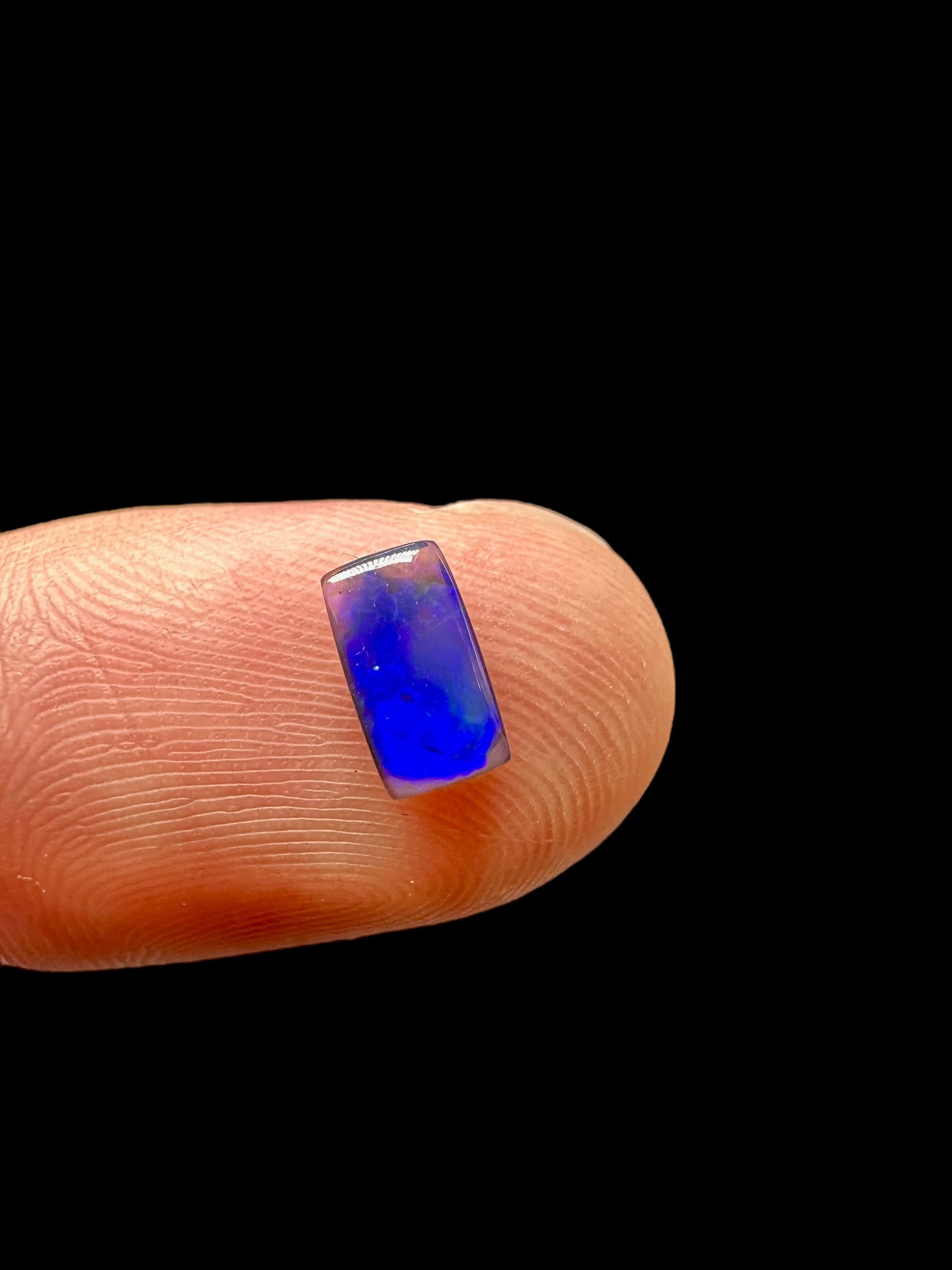 Australian black opal 0,55ct – Cabochon – Lightning Ridge, Australia - AO025
