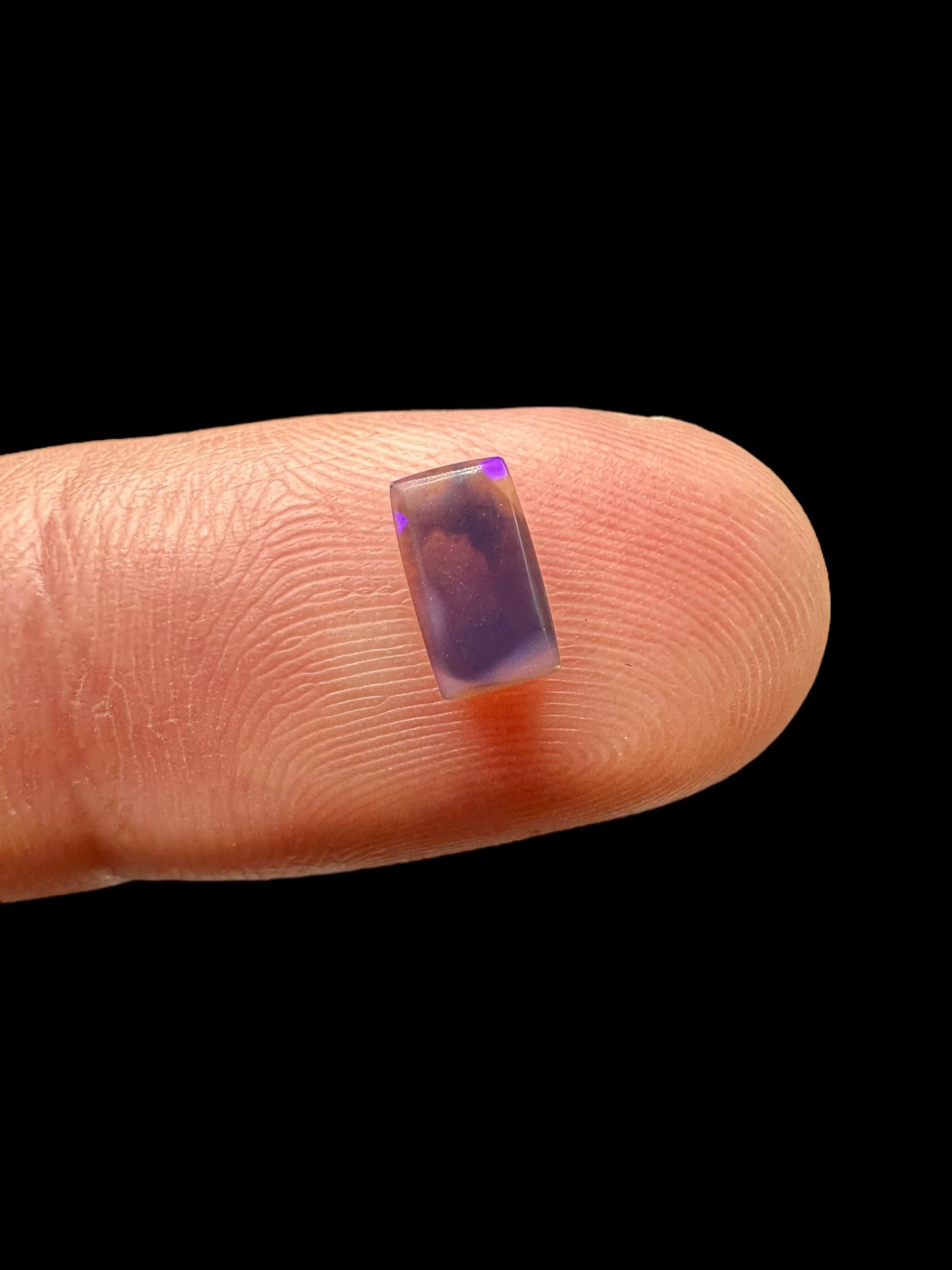 Australian black opal 0,55ct – Cabochon – Lightning Ridge, Australia - AO025
