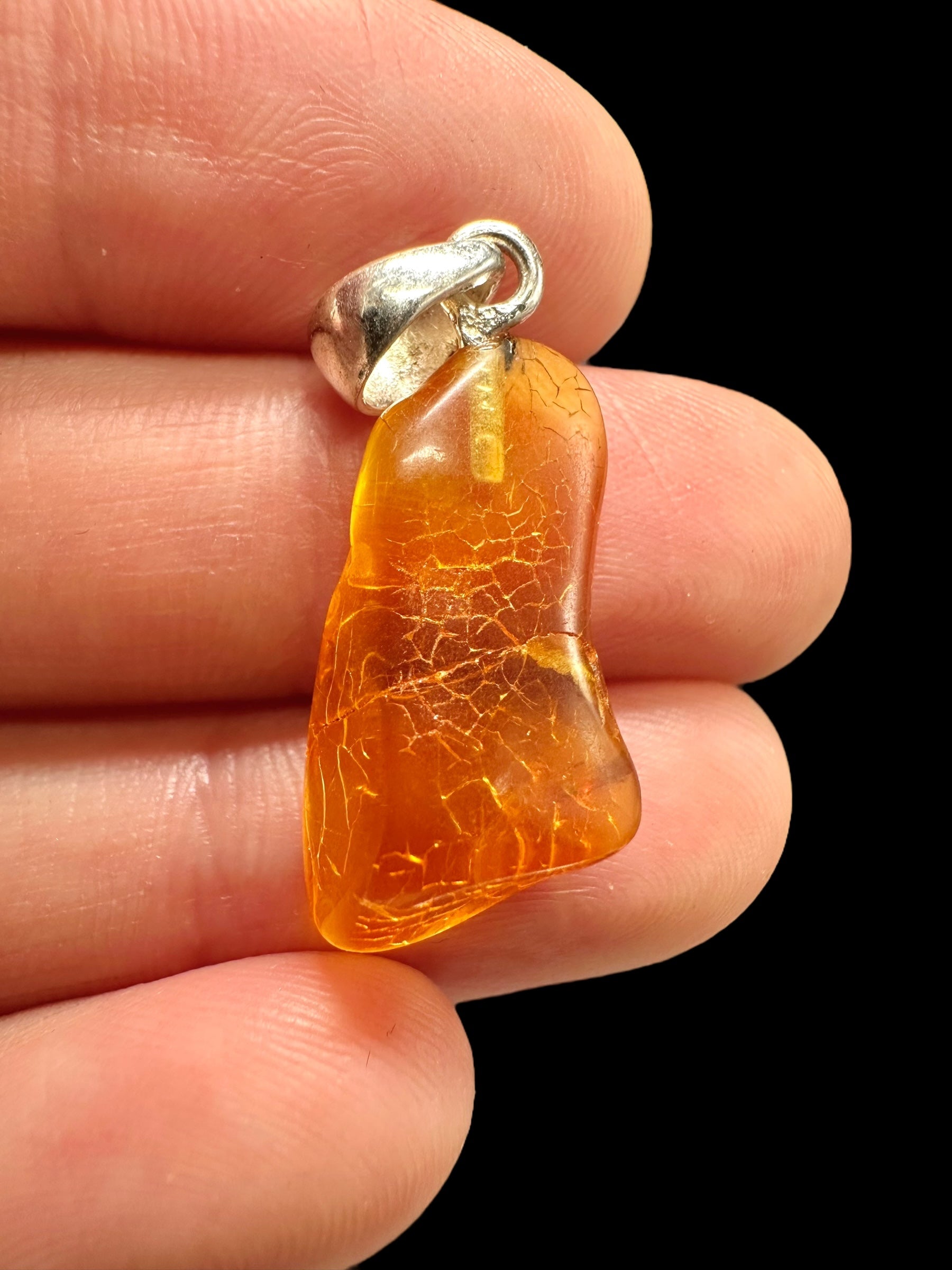 Silver amber pendant