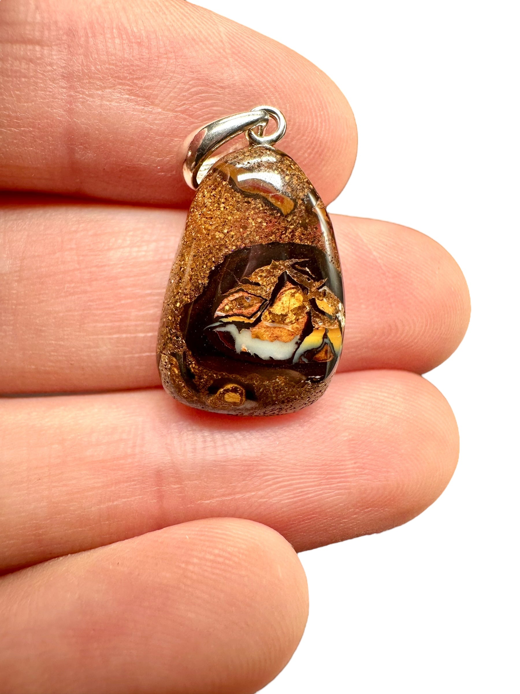 Silver pendant from Australian boulder opal