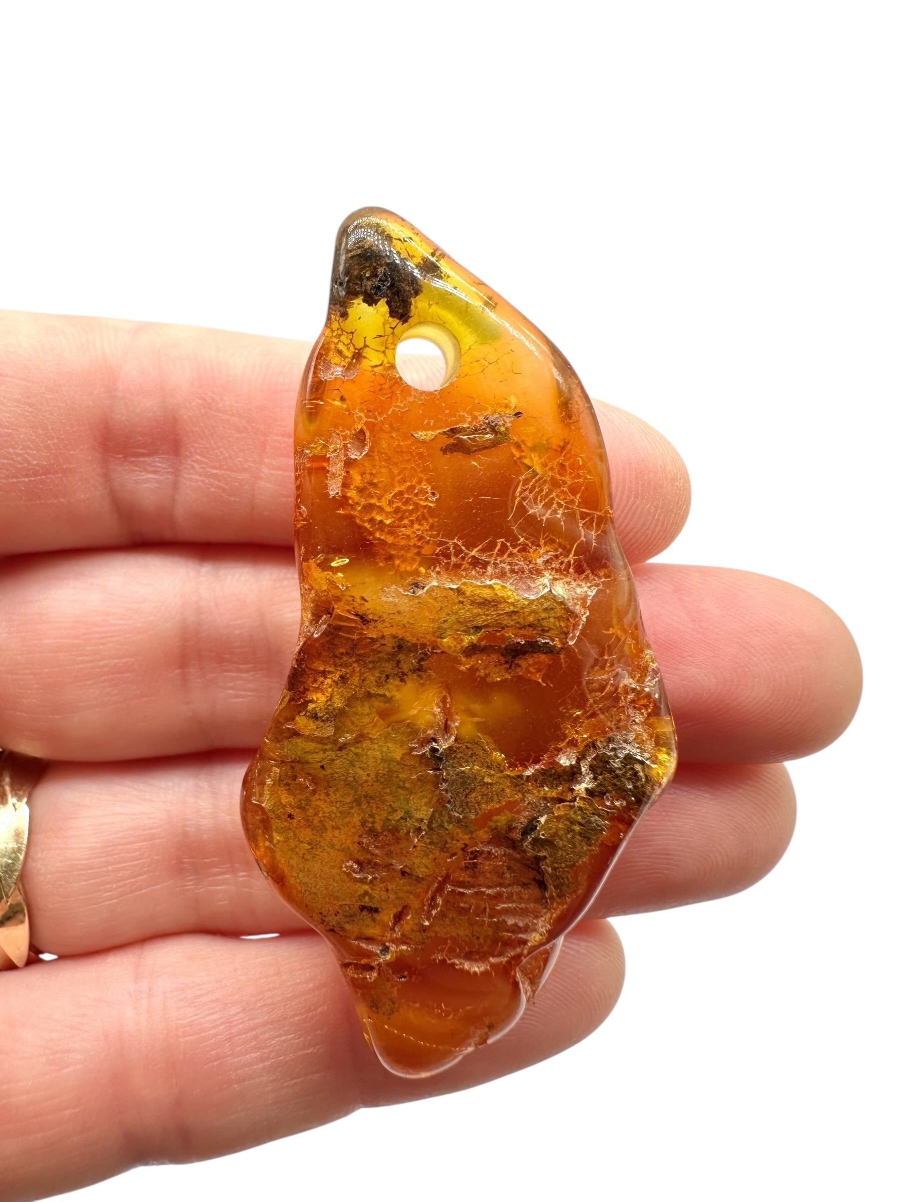 Amber with a drilled hole for hanging 9g – Lithuania