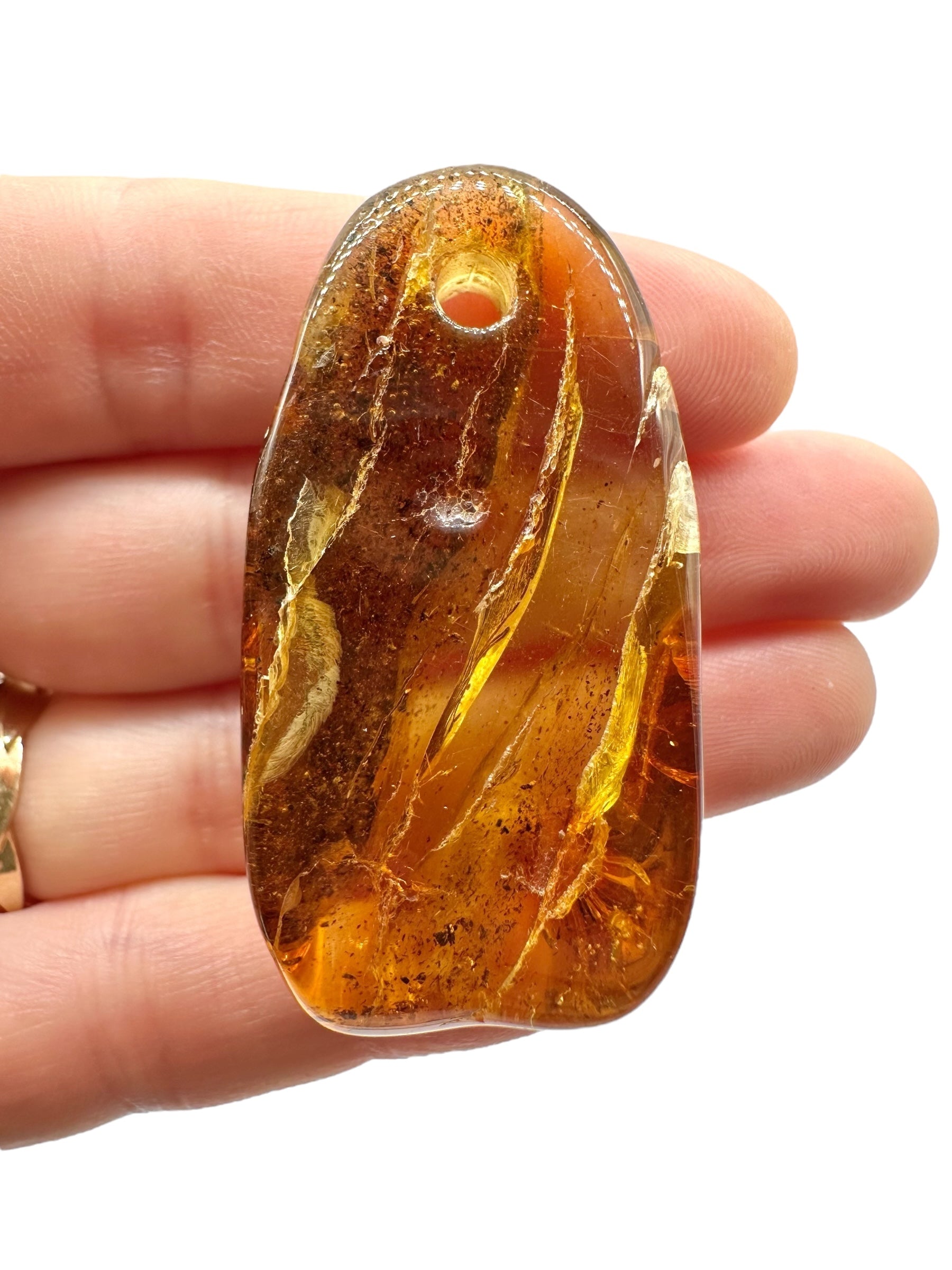 Amber with a drilled hole for hanging 9,2g – Lithuania