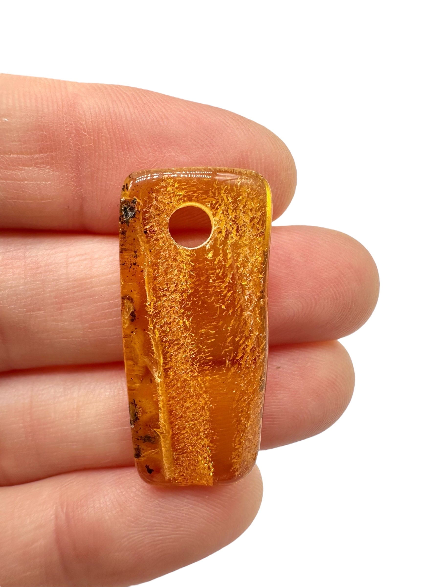 Amber with a drilled hole for hanging 1,8g – Lithuania - JND12